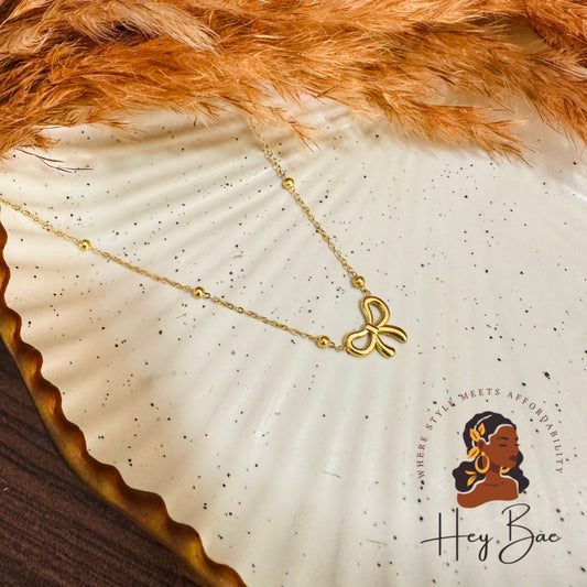 Golden Bow Pendant Necklace – Minimalist Dainty Chain for Women
