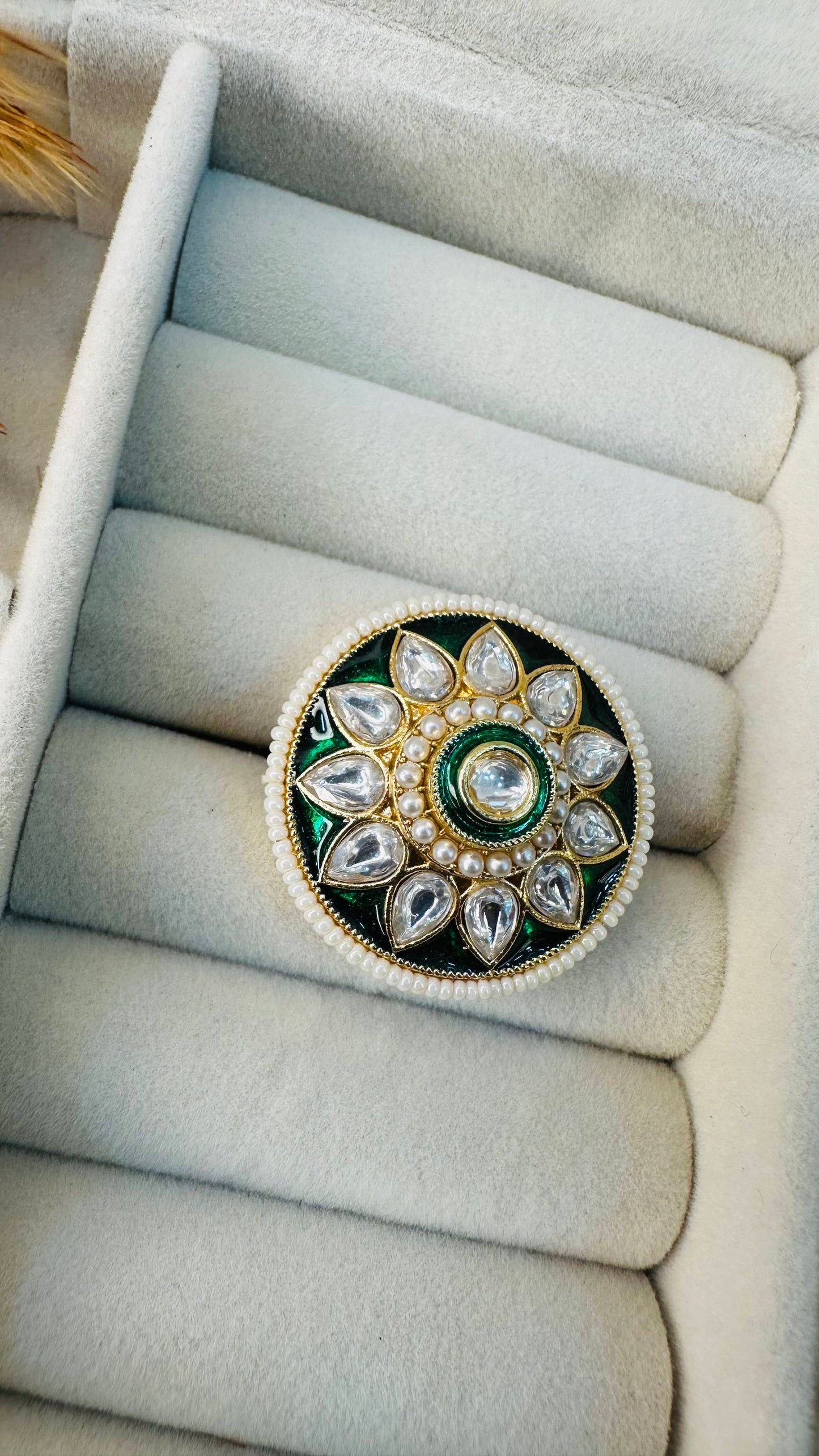 Top angle pearl bordered statement ring