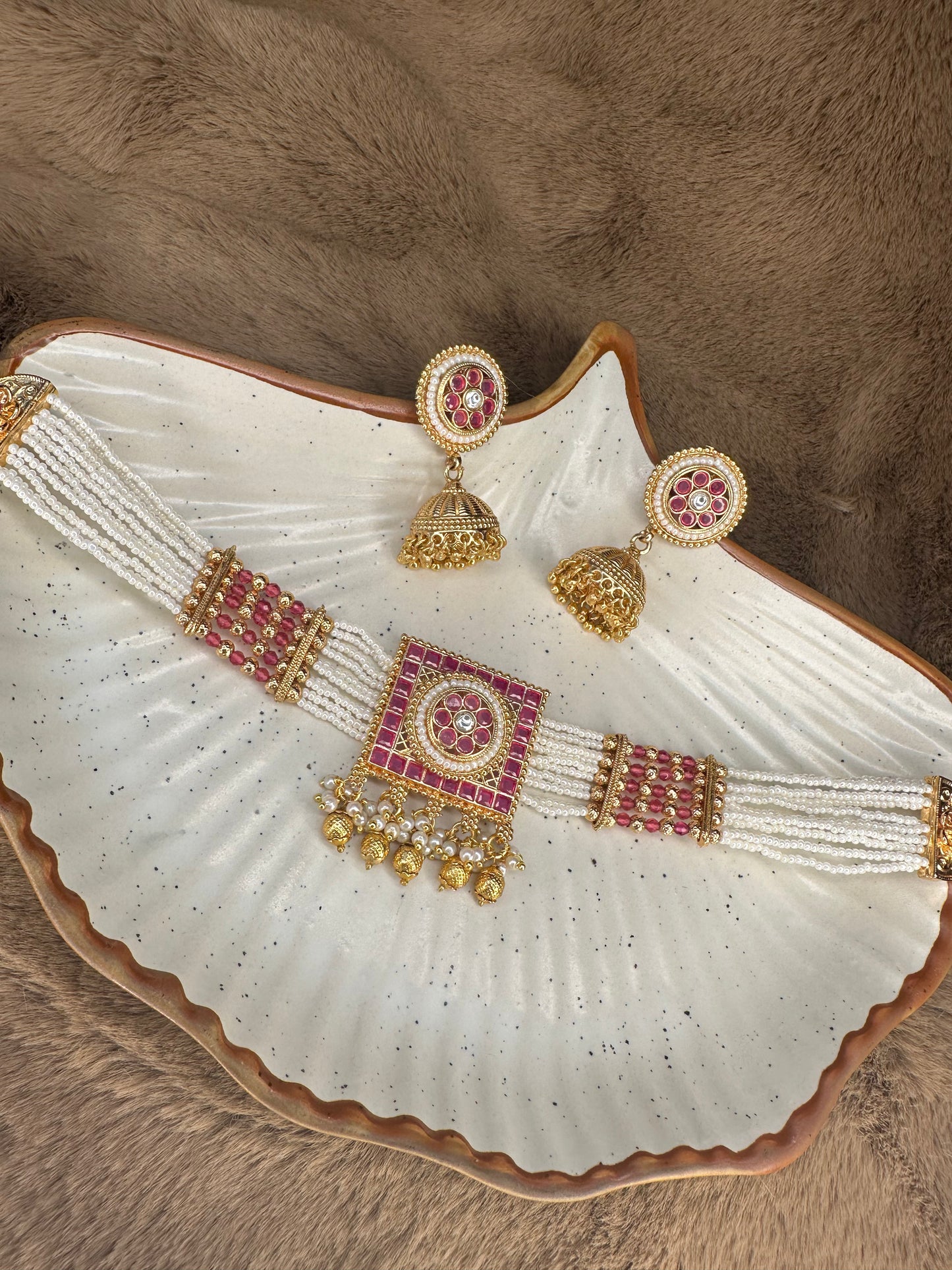 Designer choker with square ruby pendant flatlay