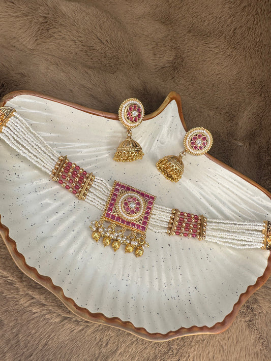 Designer choker with square ruby pendant flatlay
