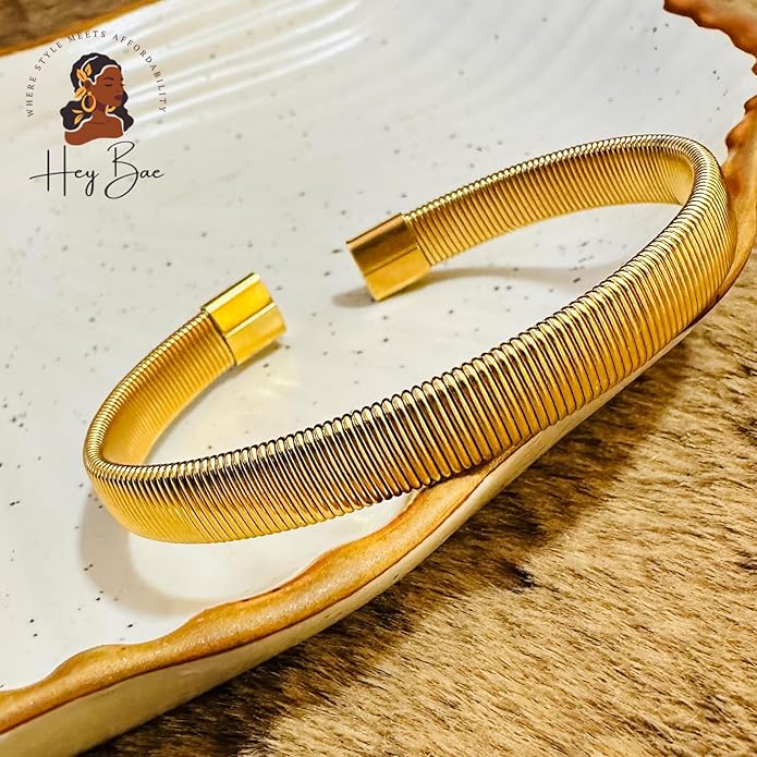 Adjustable women’s gold Kada bracelet styled with casual wear