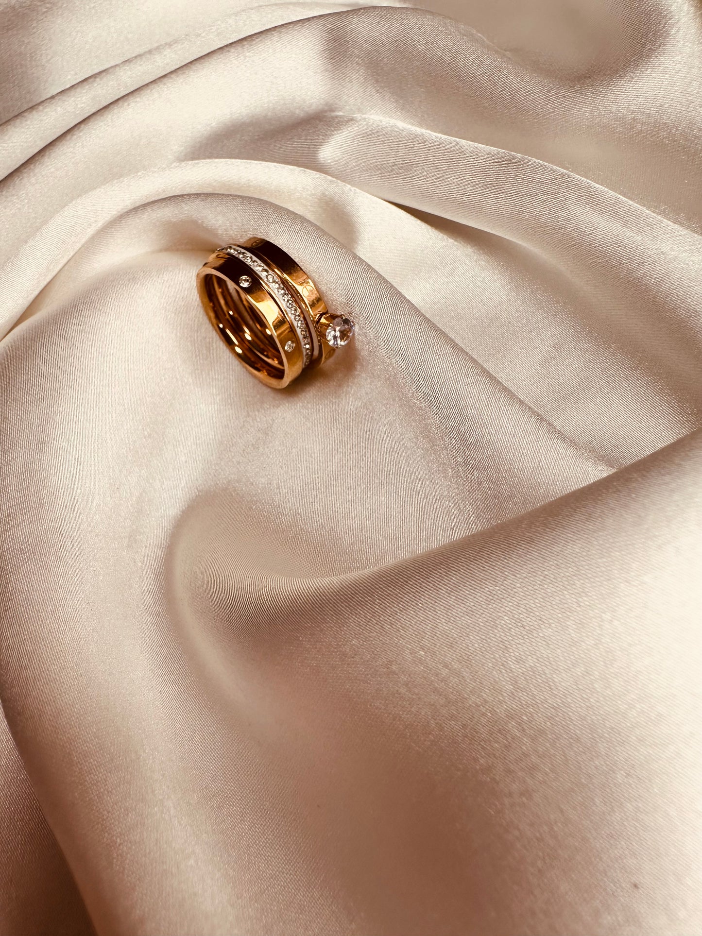 HeyBae 3 Stack Rings styled on hand – chic rose gold stainless steel solitaire and band rings