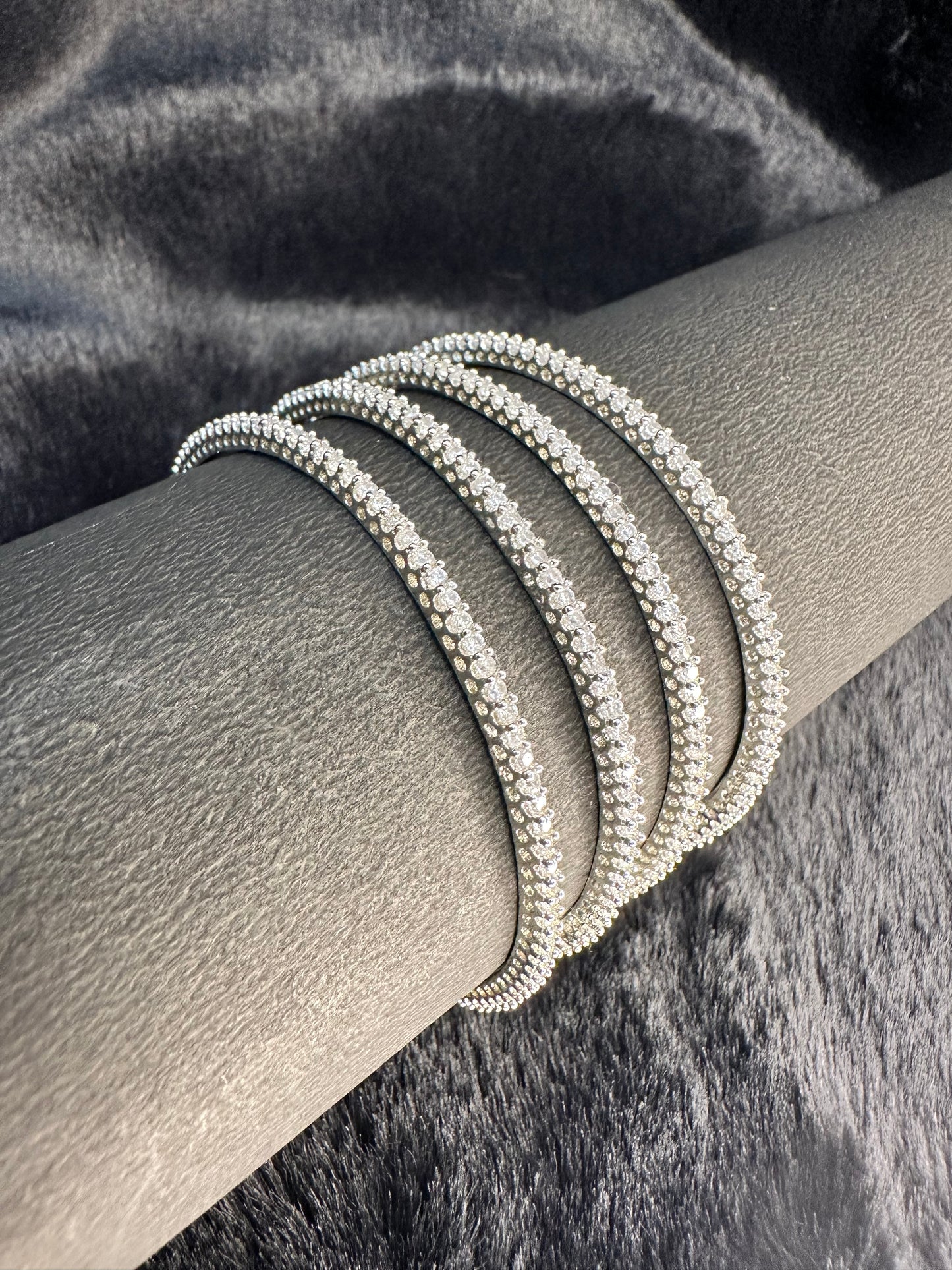 Zoomed-in detailing of sparkling American Diamond stones in HeyBae bangles