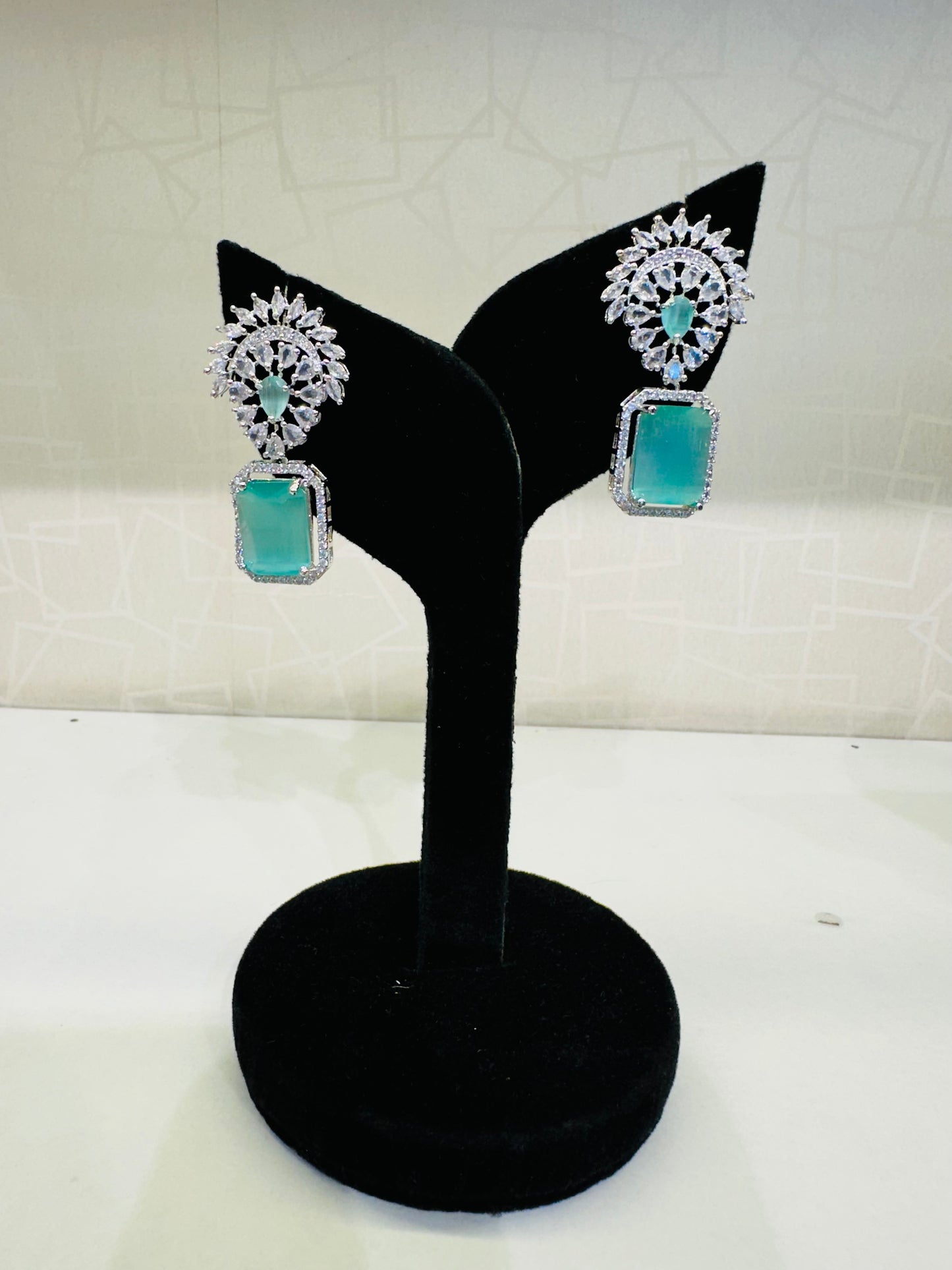 Model styling HeyBae AD Stud Drop Stone Earrings for ethnic wear