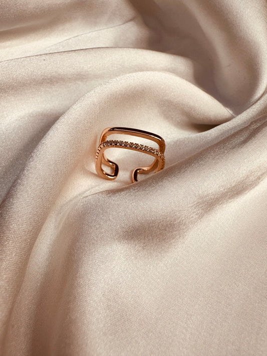 Close-up of HeyBae Adjustable AD Studded Ring showing polished stainless steel band with shimmering American Diamond stones