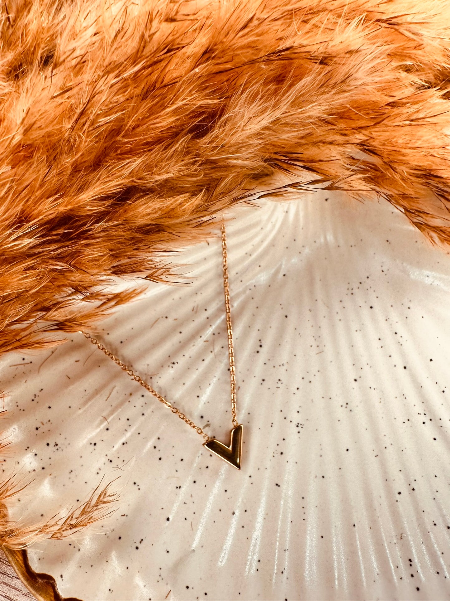 Affordable HeyBae V pendant necklace in gold, priced at ₹499