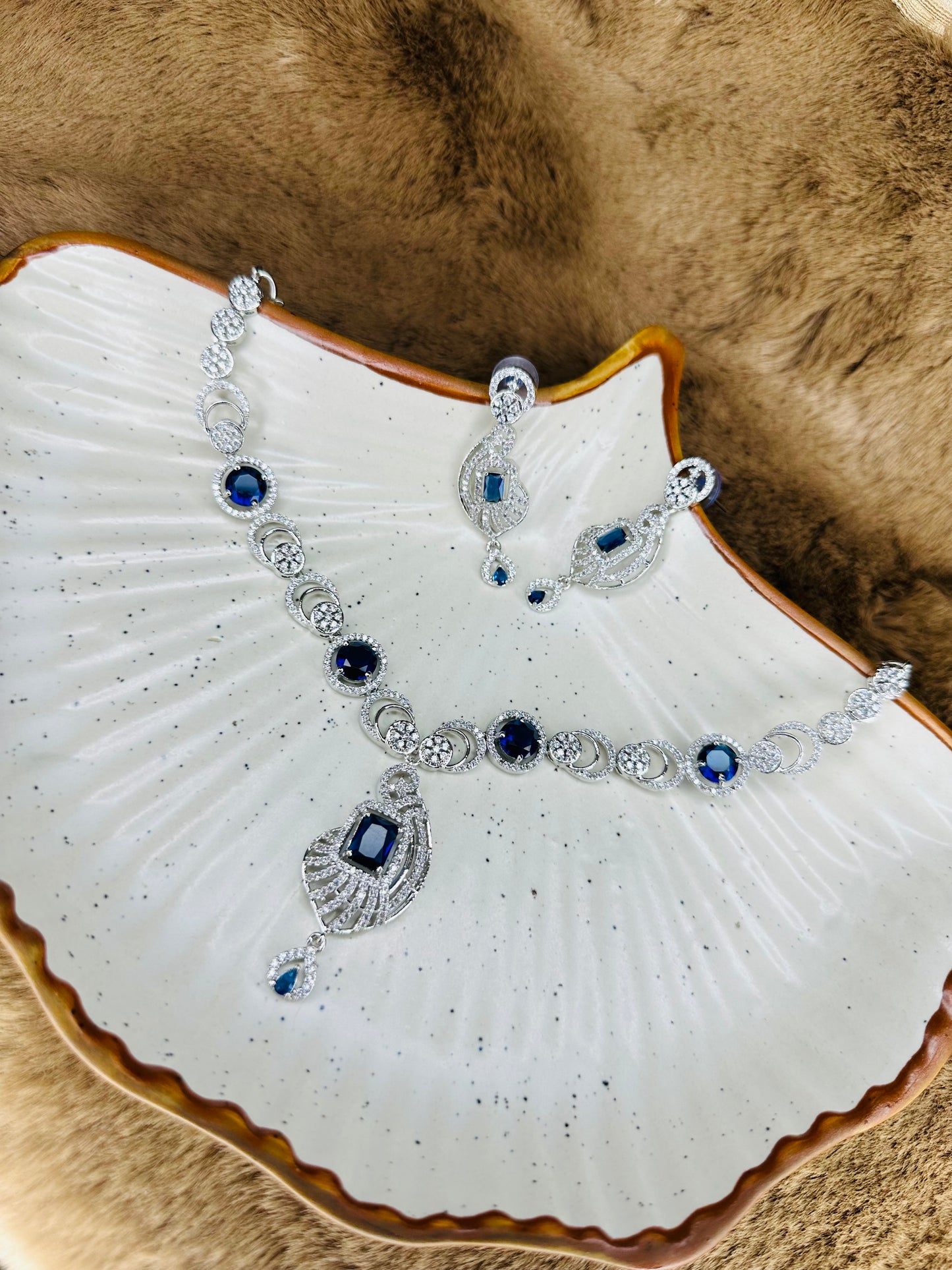 Luxury Shot of HeyBae American Diamond Necklace & Earrings in Dual Tone Stones