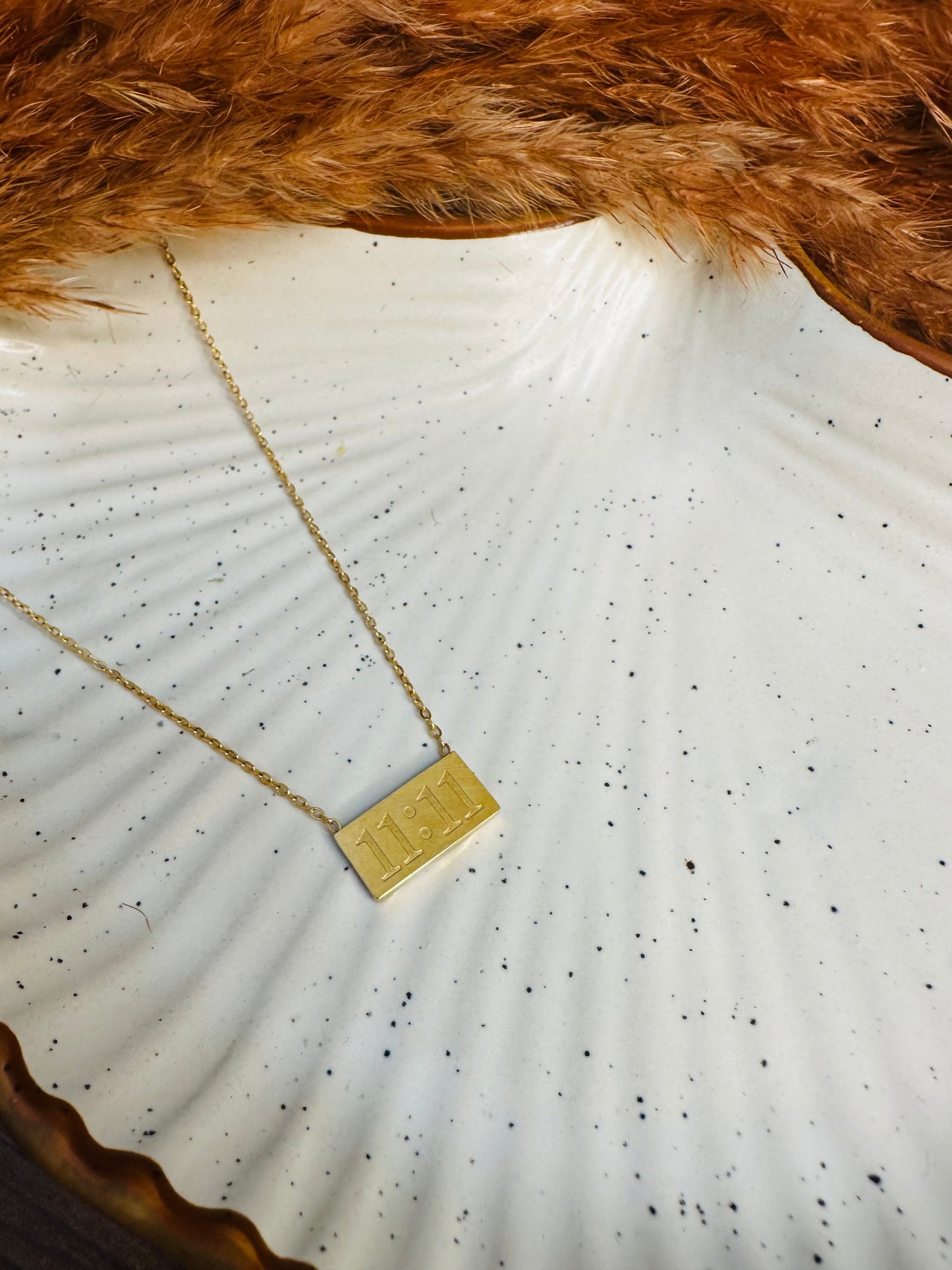Flatlay view of HeyBae 11:11 Angel Pendant Necklace – Anti Tarnish Jewelry