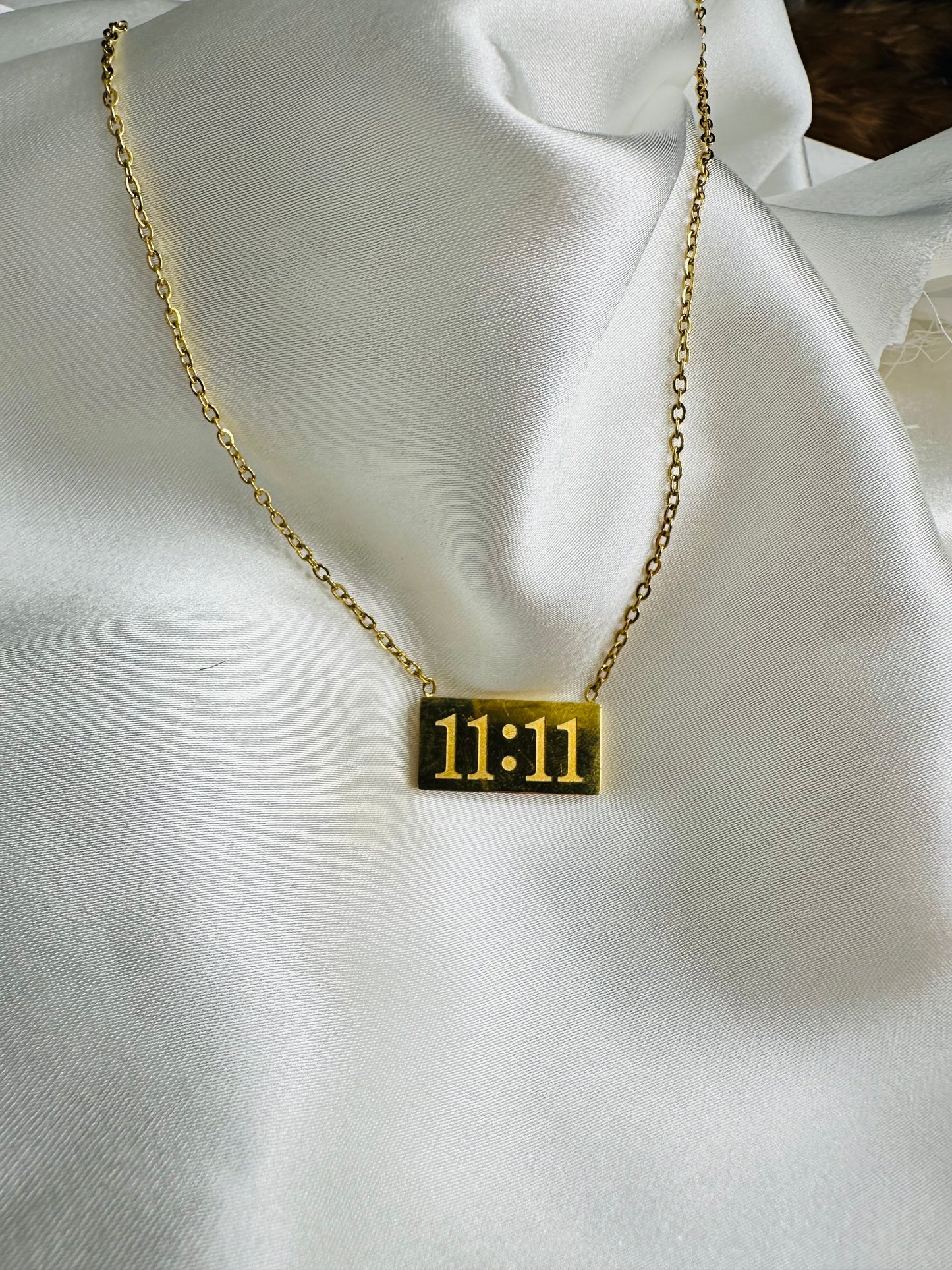 Close-up of HeyBae 11:11 Angel Pendant Necklace with Good Luck Charm