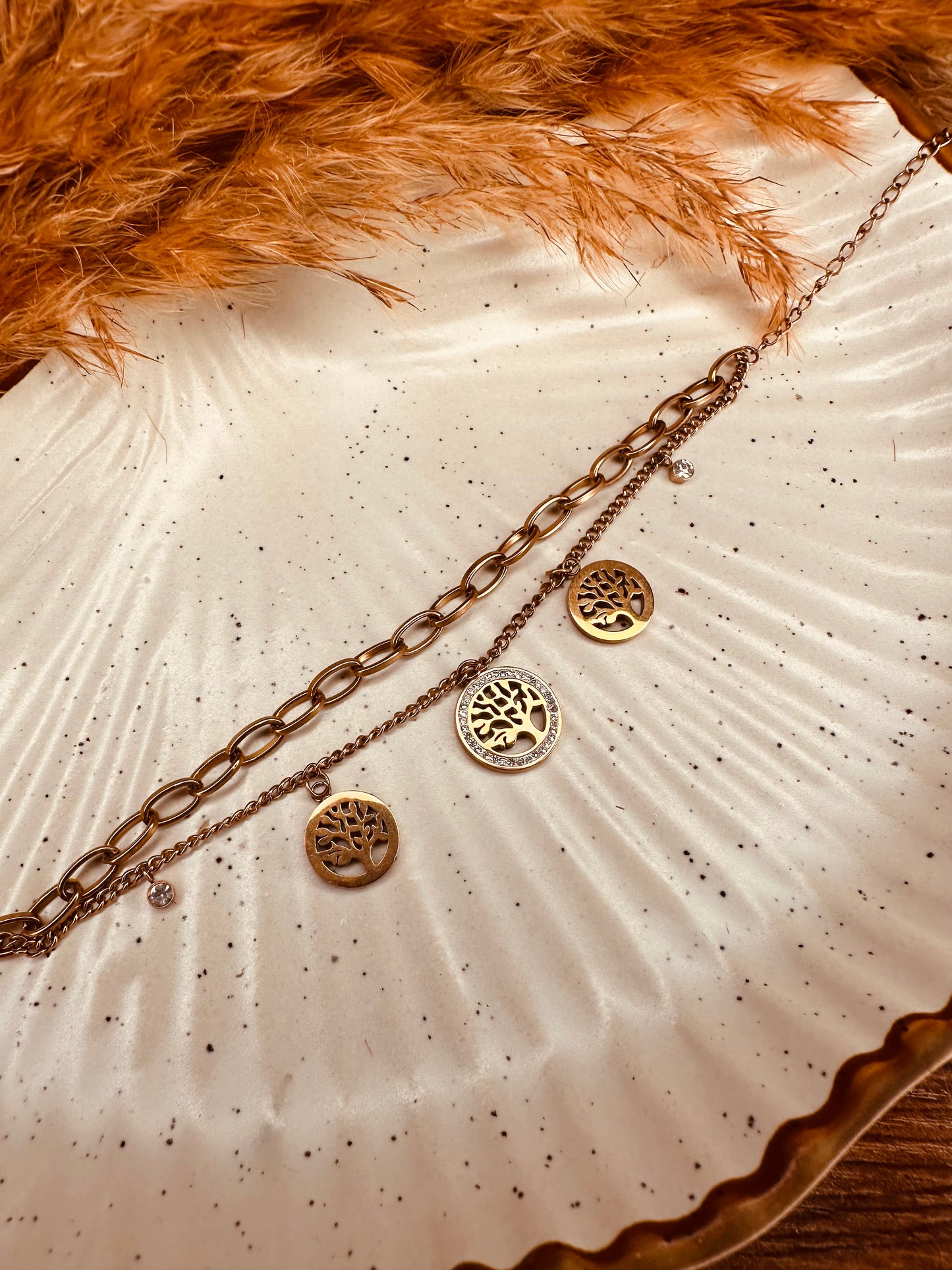 Anti-tarnish gold charm bracelet with symbolic tree design by HeyBae