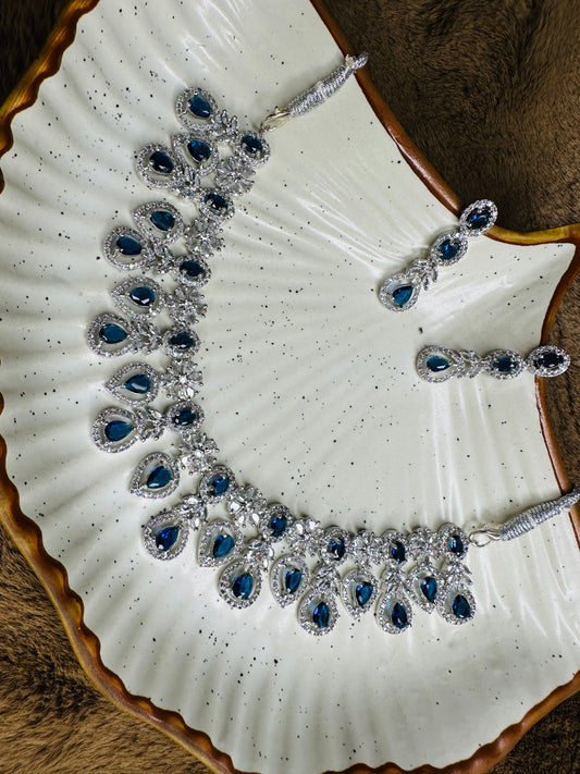 Close-up of HeyBae Blue Stone American Diamond Necklace & Earrings with Sparkling Finish