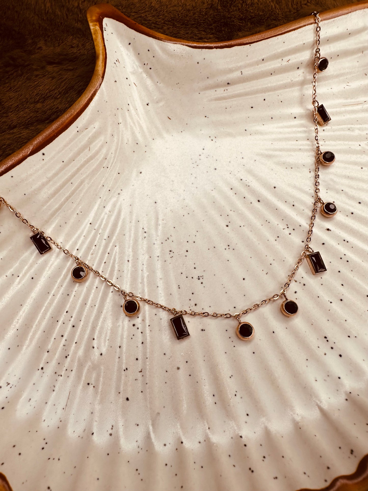Side view of HeyBae Stainless Steel Charm Pendant Necklace