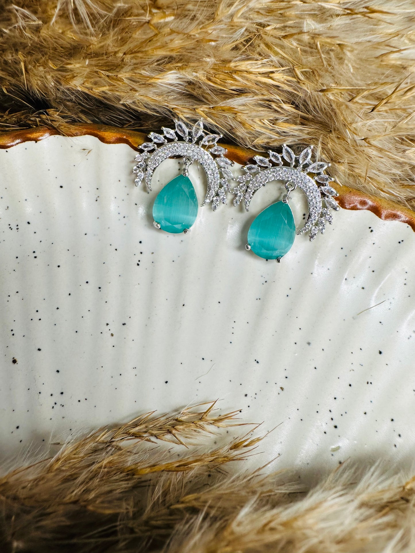 Display of HeyBae Elegant AD Stud Teardrop Earrings with fine detailing