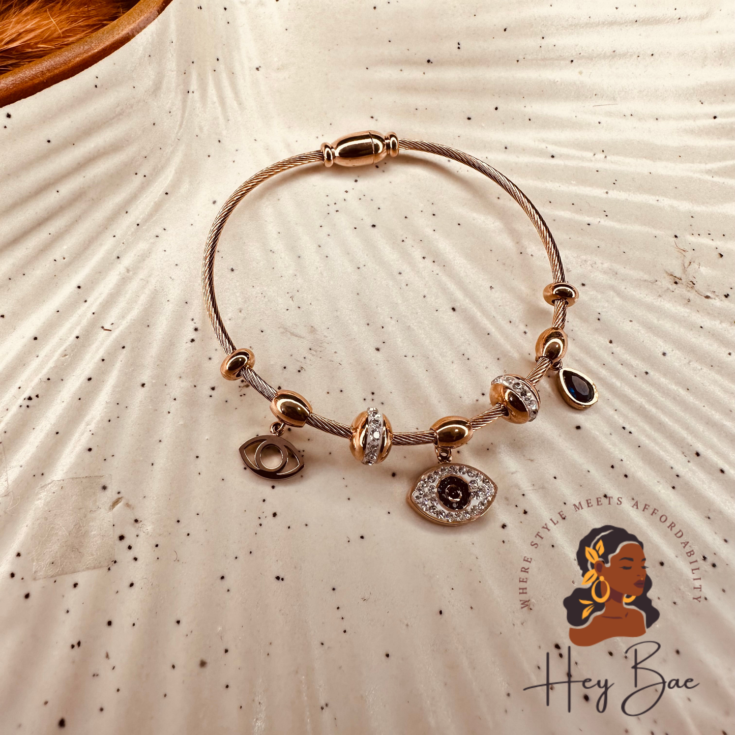 Side view of HeyBae Rose Gold Evil Eye Bangle – Anti-Tarnish Magnetic Bracelet for Women