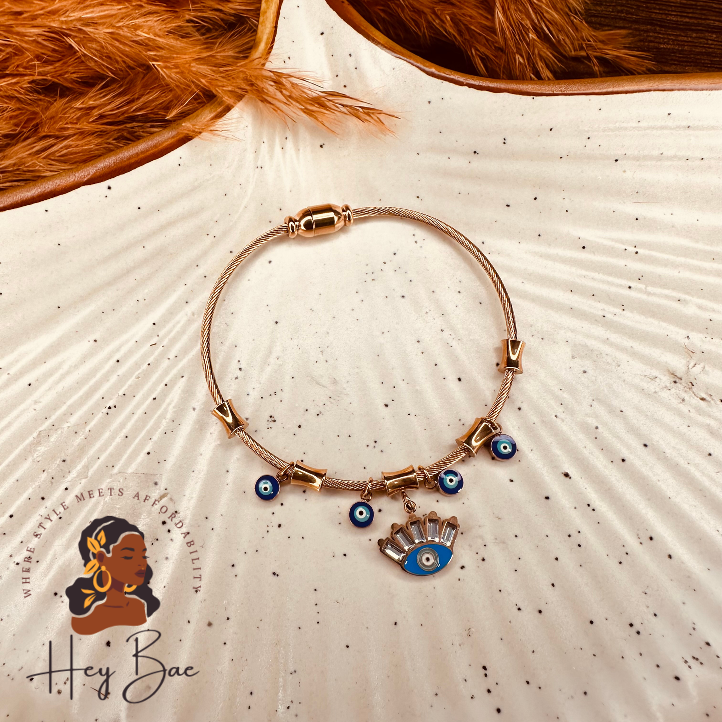 HeyBae Anti-Tarnish Evil Eye Bangle styled on wrist – Rose Gold Magnetic Bracelet for Women