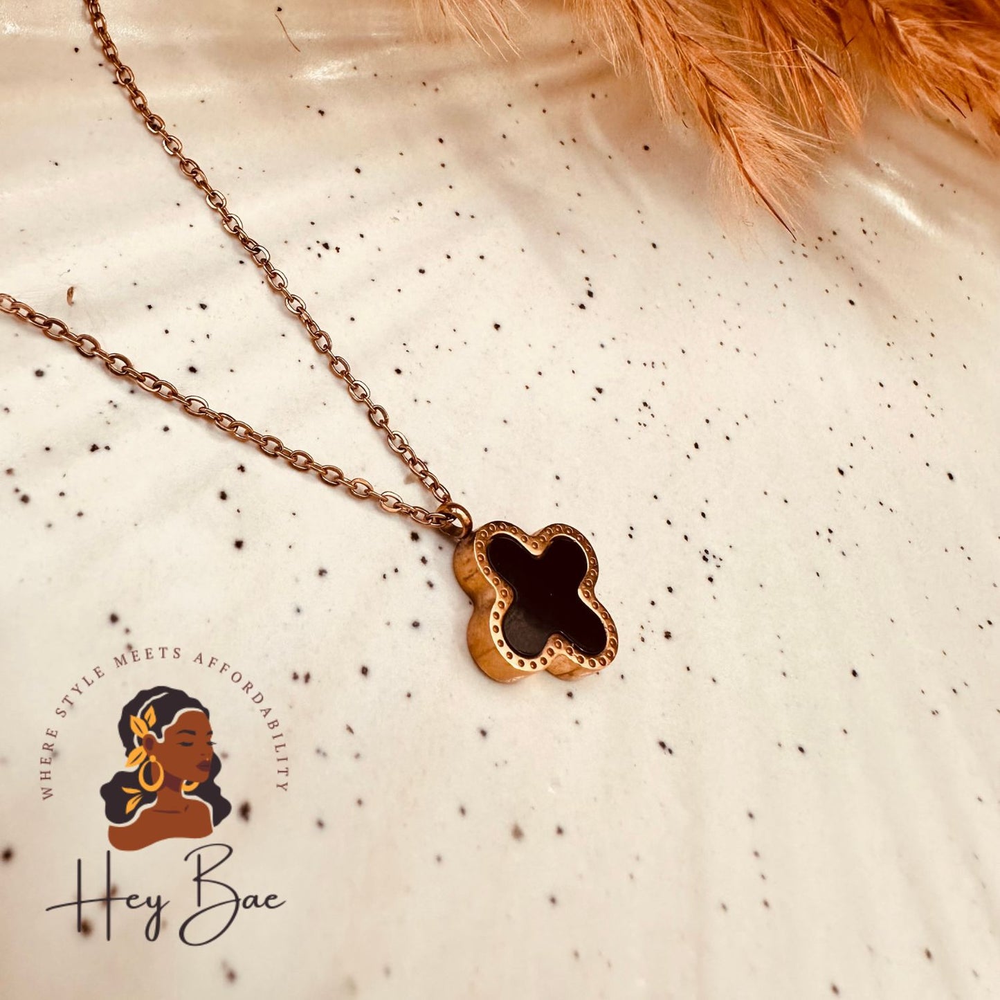 Side angle of HeyBae Four Leaf Clover Pendant Necklace in Stainless Steel