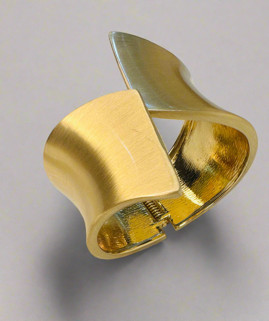 Geometric gold cuff bracelet paired with saree and lehenga for ethnic styling