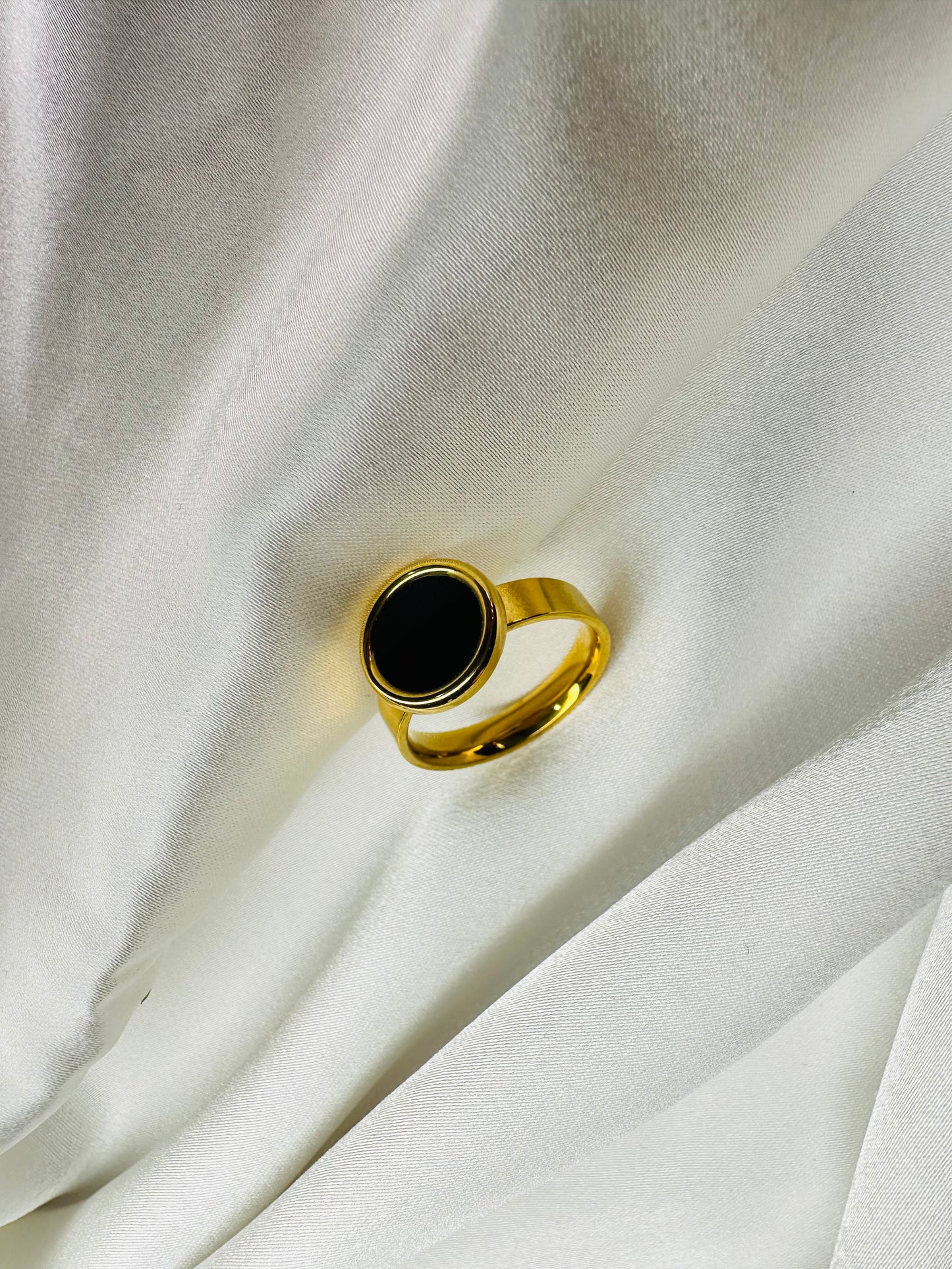 HeyBae gold black stone ring on hand – stylish stainless steel women’s ring