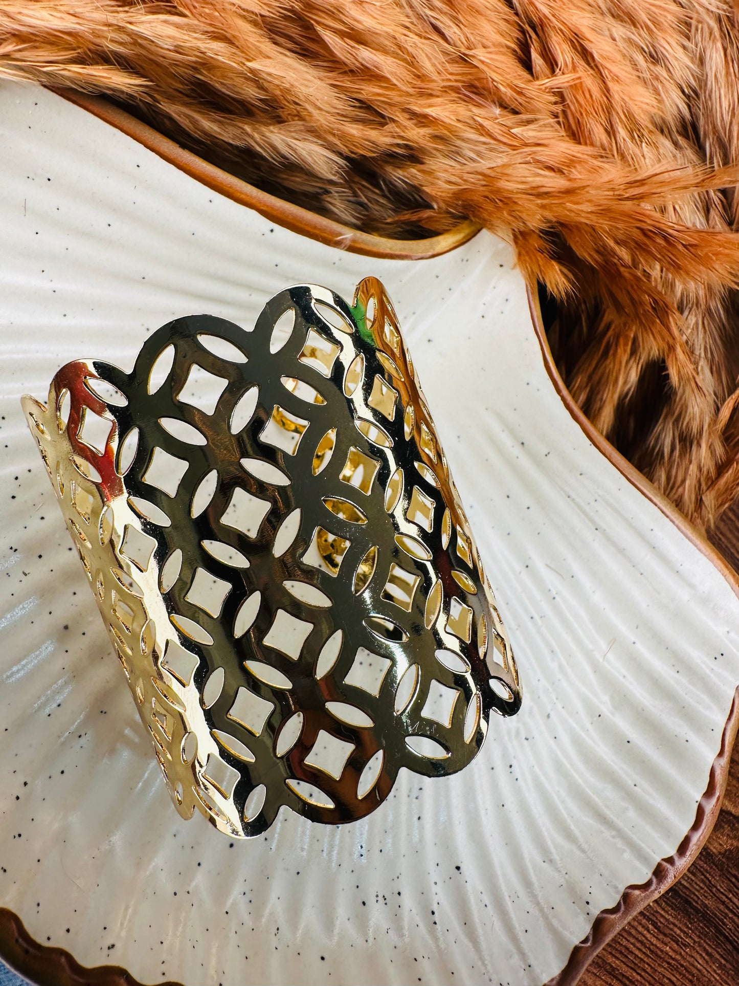 Gold cuff bracelet set styled on hand for festive traditional wear