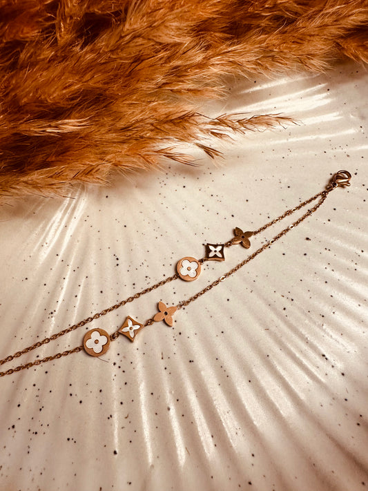 Adjustable dual-layer gold bracelet with stainless steel finish