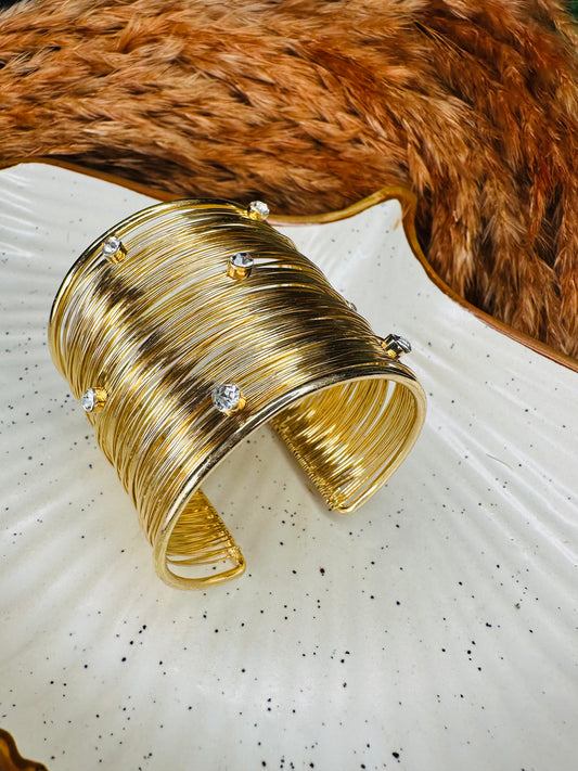 Gold ethnic bangles set styled on hand for traditional wear