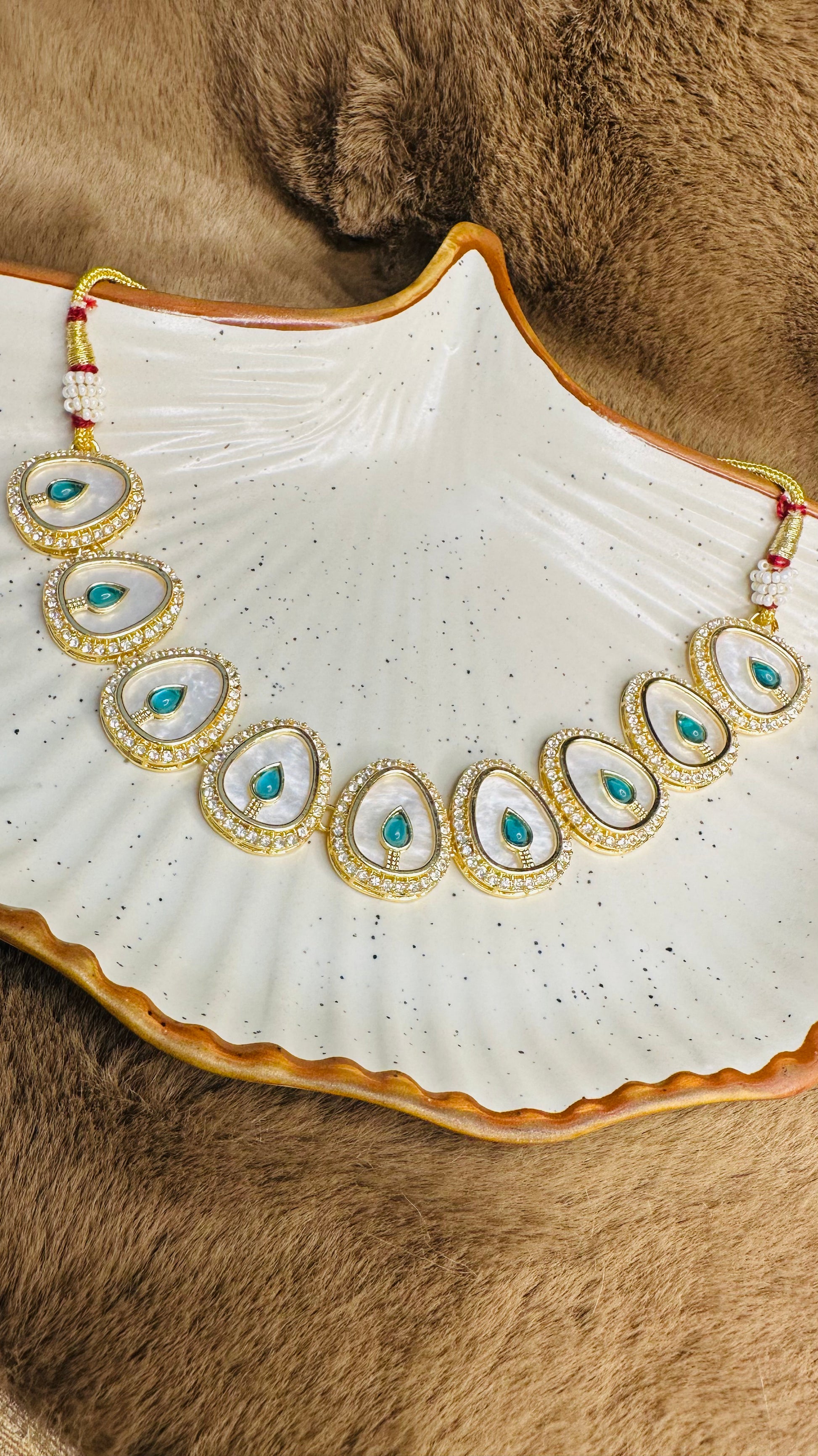 Gold plated earrings with maroon stones & pearl drops