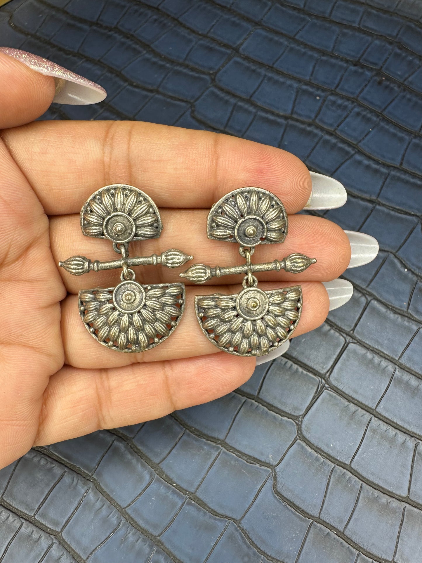 Flat Lay Display of HeyBae Oxidised Brass Drop Earrings with Antique Shine