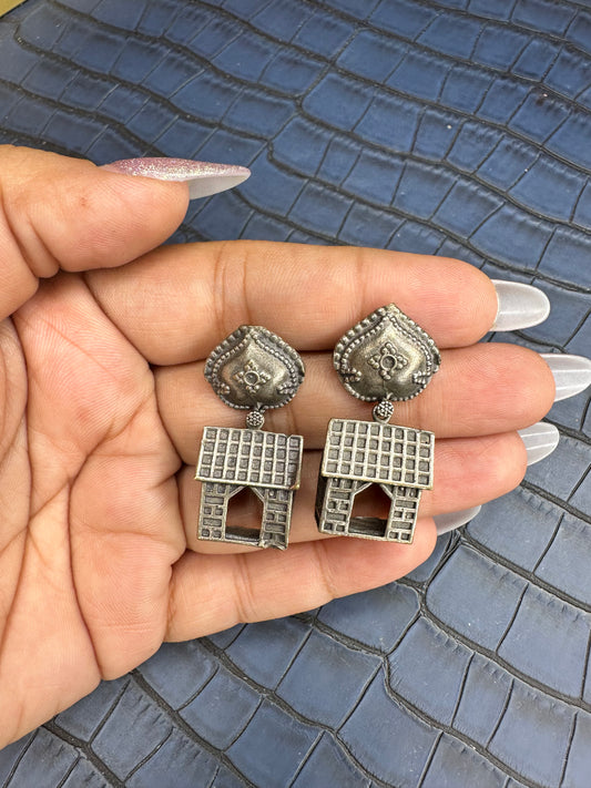 Side Look of HeyBae Oxidised Brass Drop Earrings with Antique Finish