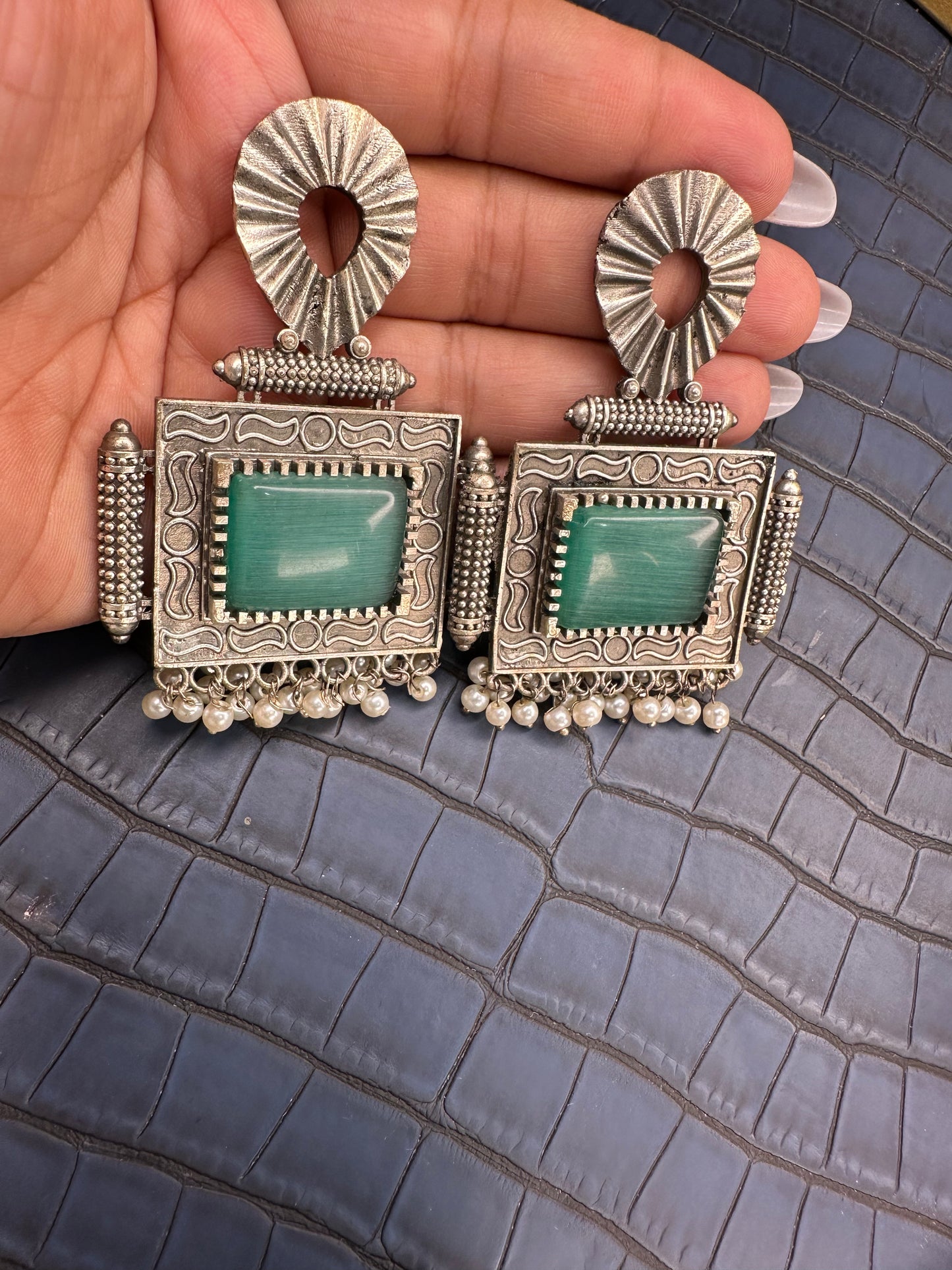 Side Angle View of HeyBae Big Oxidised Earrings in Antique Finish