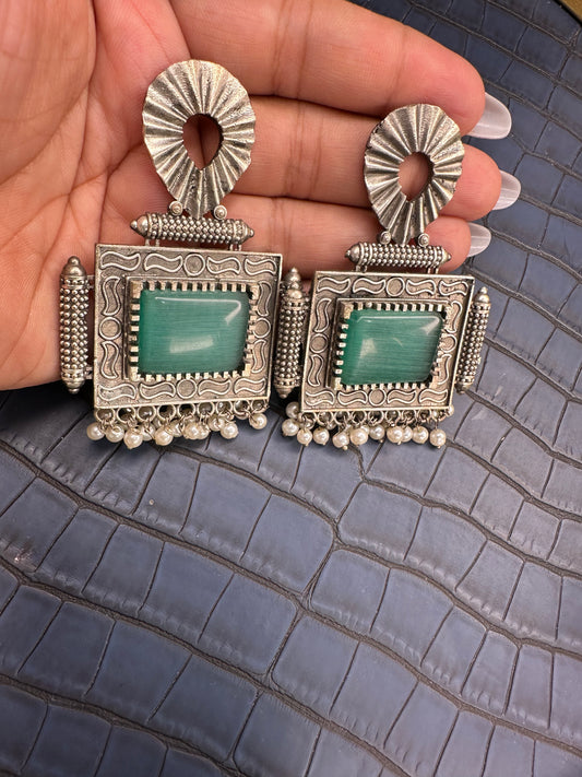 Side Angle View of HeyBae Big Oxidised Earrings in Antique Finish