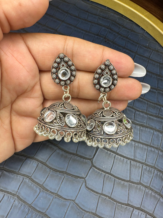 Side View of HeyBae Oxidised Brass Kundan Jhumka Earrings