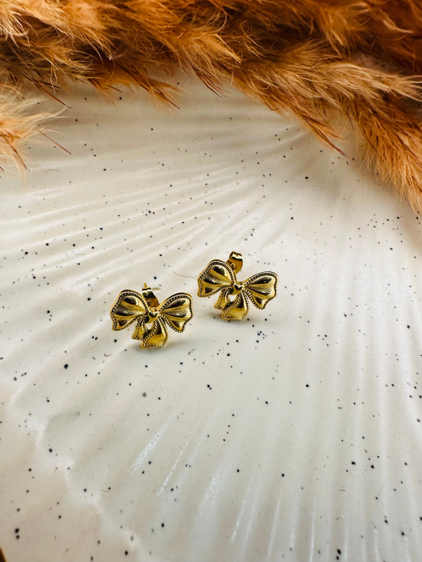 Premium HeyBae gold bow earrings perfect for gifting