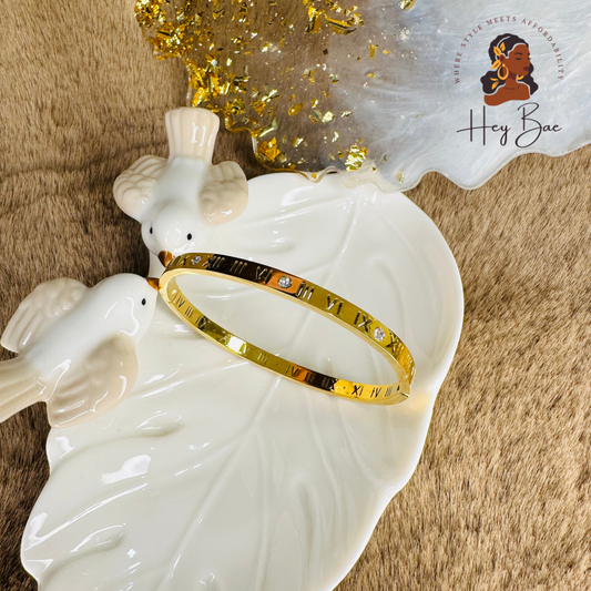 Close-up of HeyBae Roman Numbers Kada with elegant engraved numerals and anti-tarnish gold finish