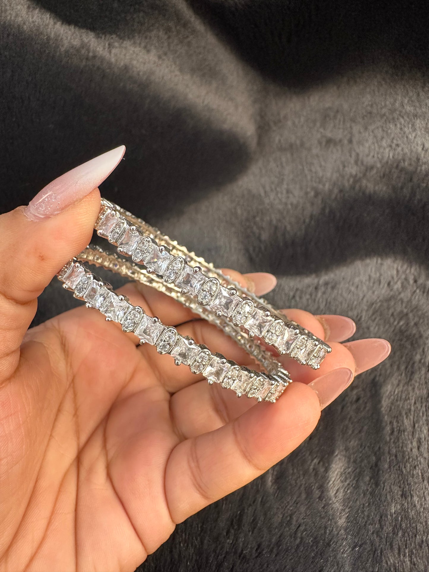 Side profile of HeyBae Sparkling Silver AD Bangle displaying smooth edge and stone detail