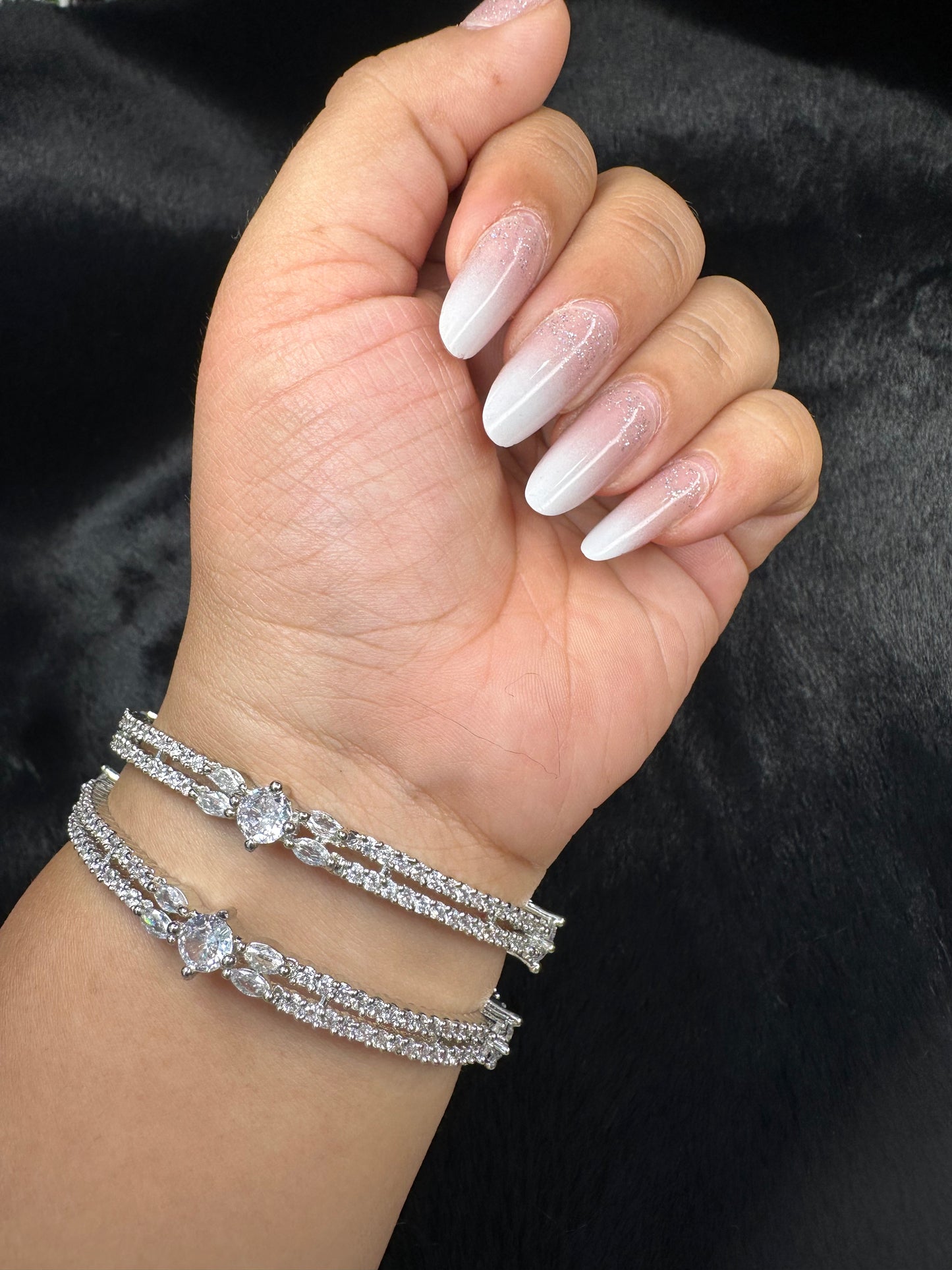 HeyBae silver bangle worn on wrist