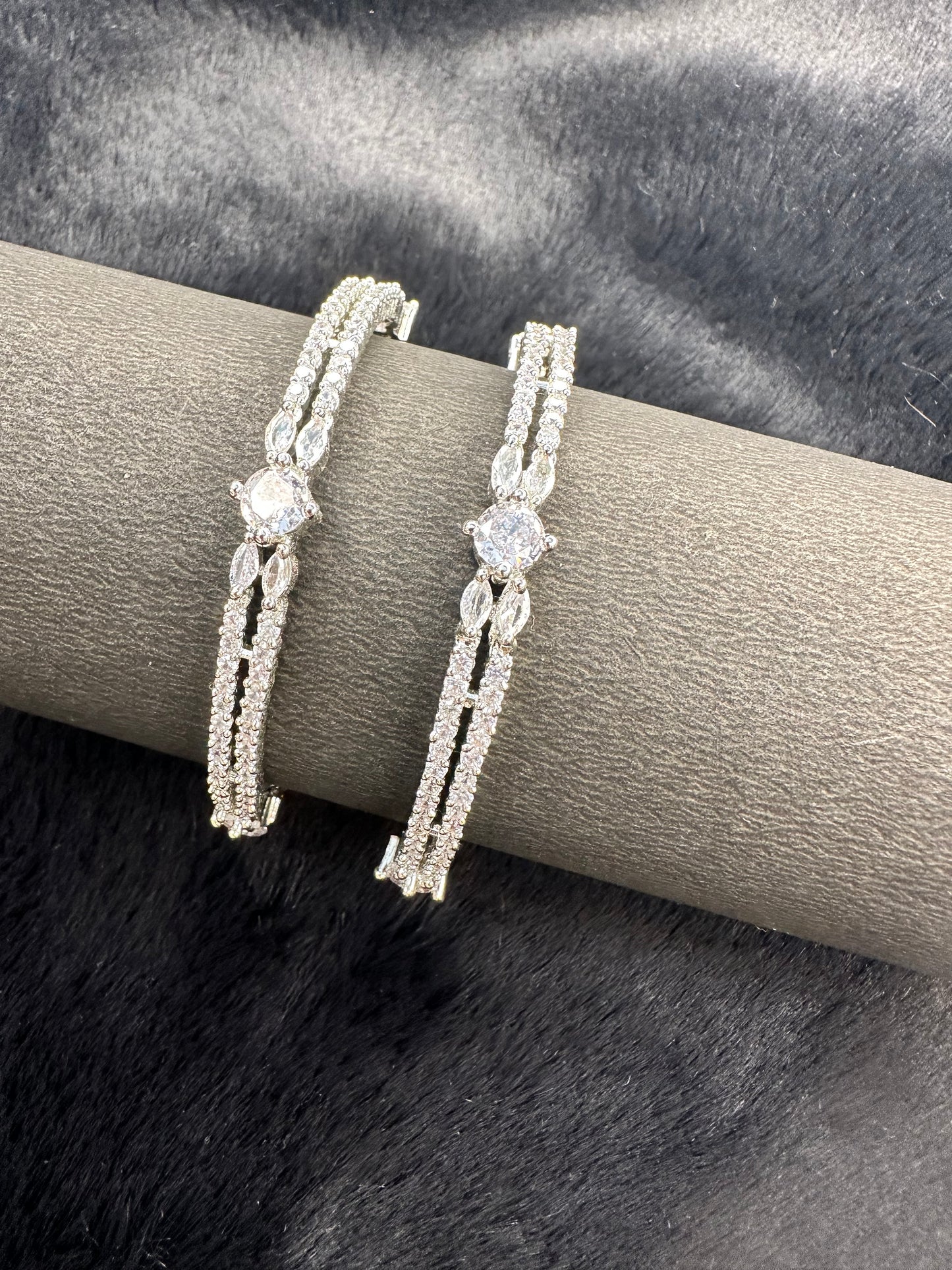 Side profile of silver-tone HeyBae bangle