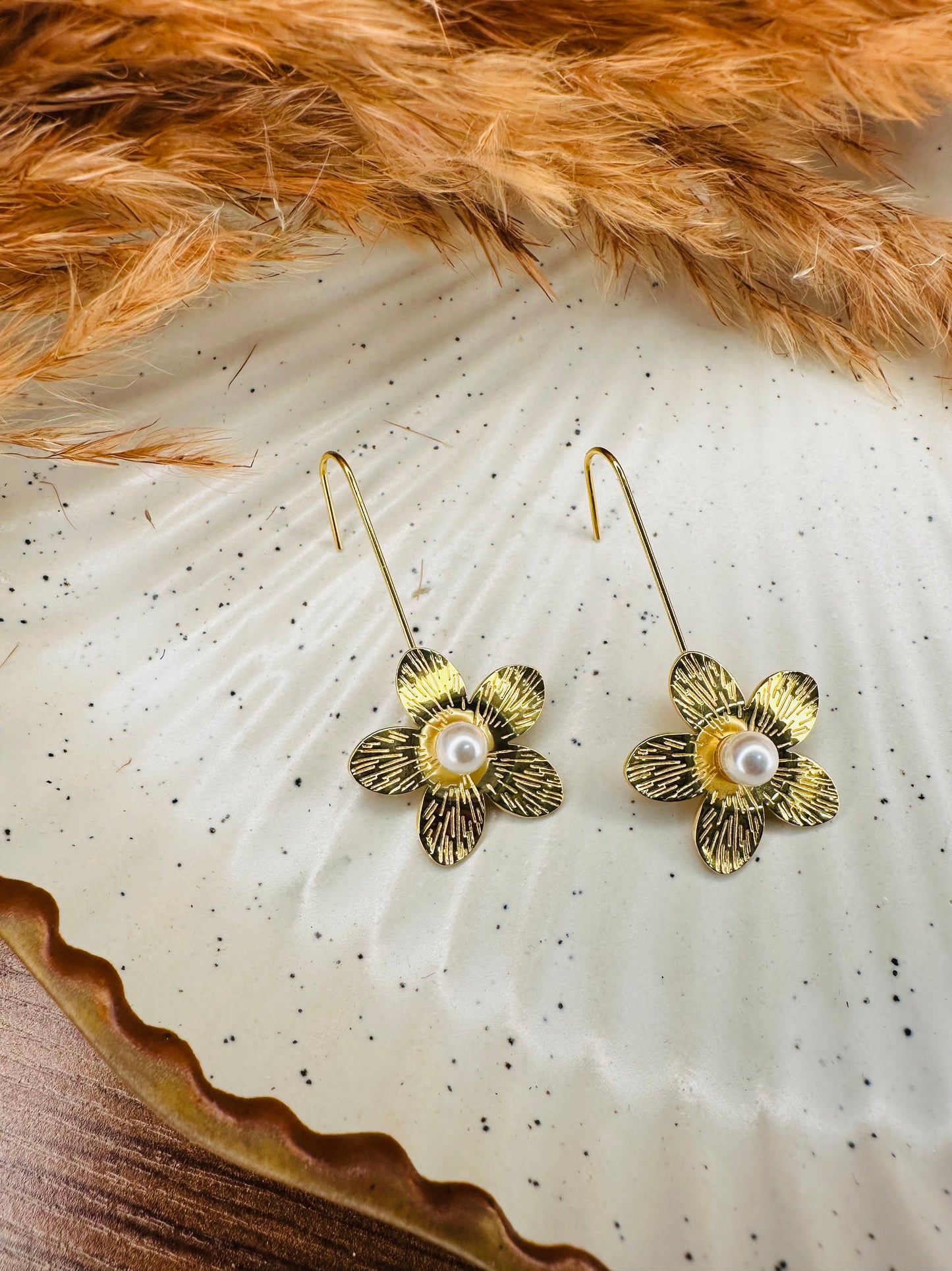 Close-up of HeyBae Sleek Gold-Plated Teardrop Flower Earrings