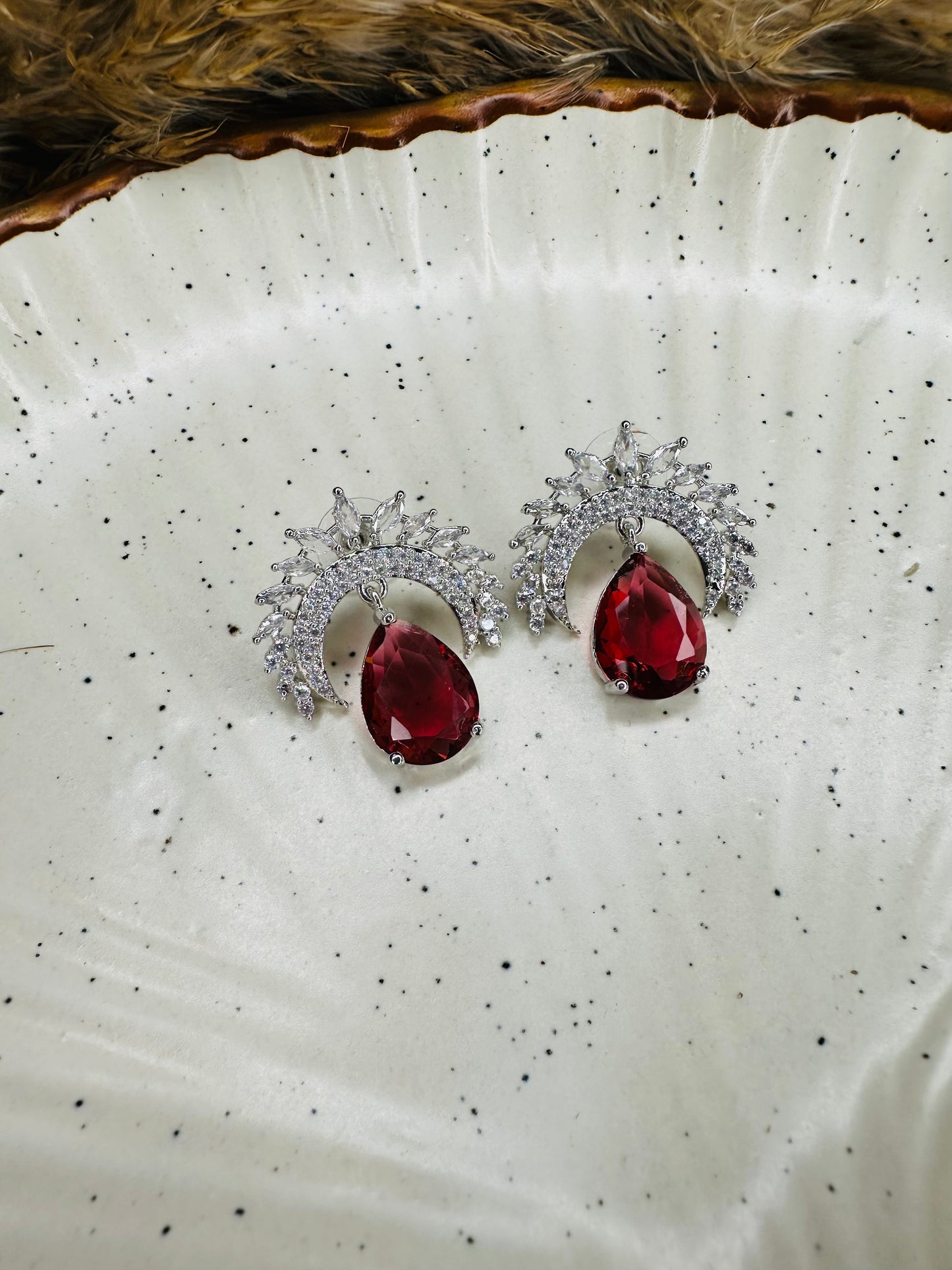 Side view of HeyBae AD Stud Teardrop Stone Earrings in ethnic style