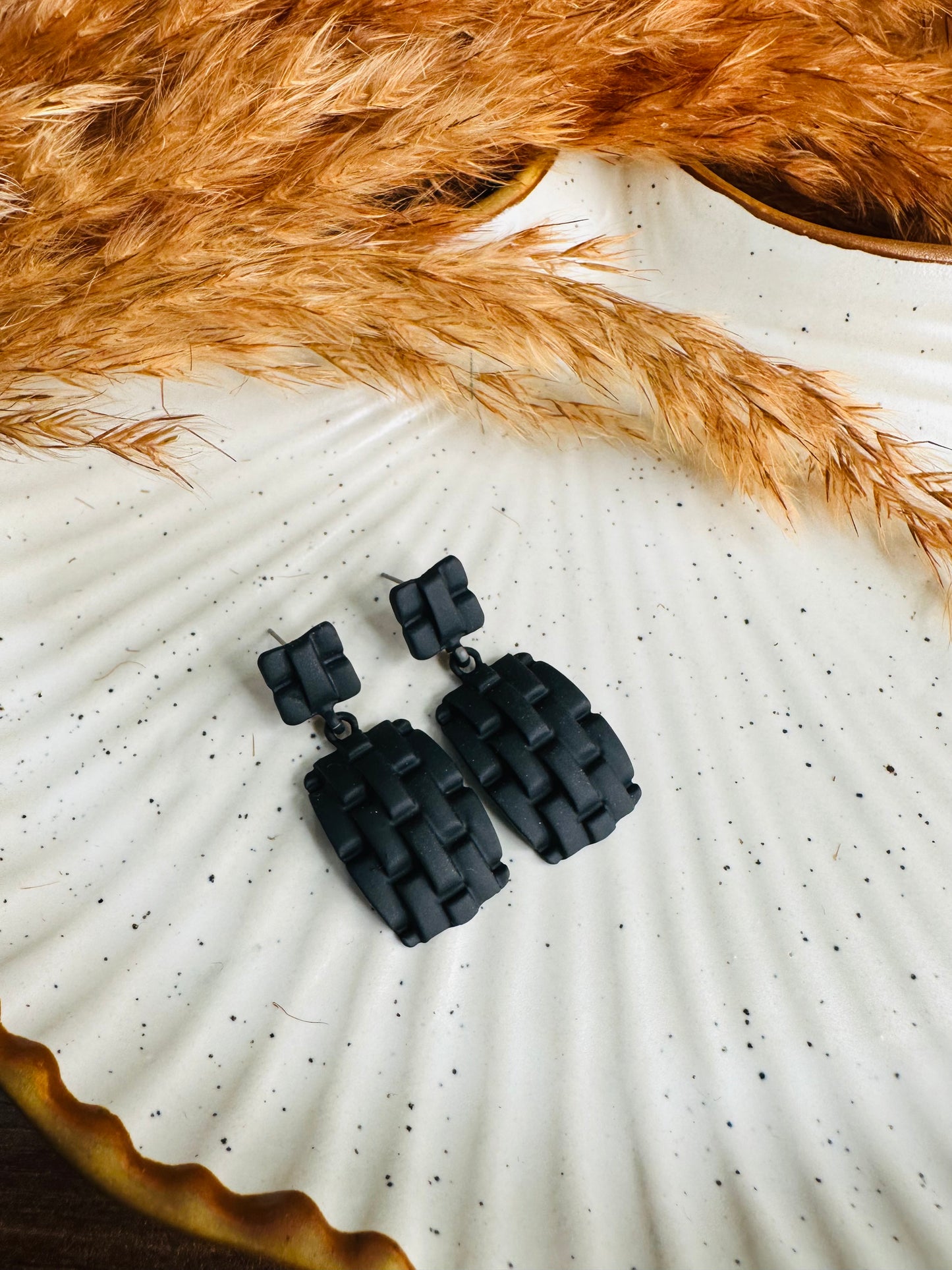 Close-up Detailing of HeyBae Quirky Textured Drop Earrings with Glossy Finish
