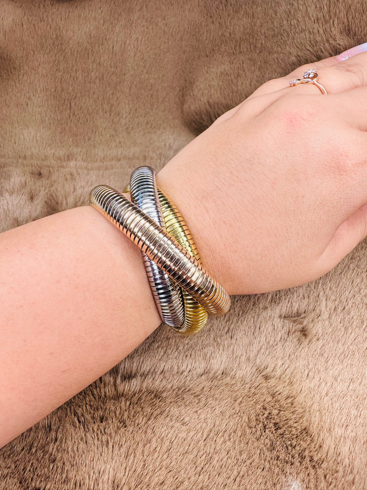 Woman wearing HeyBae Triple Coil Chunky Gold Bracelet – Fashion Kada