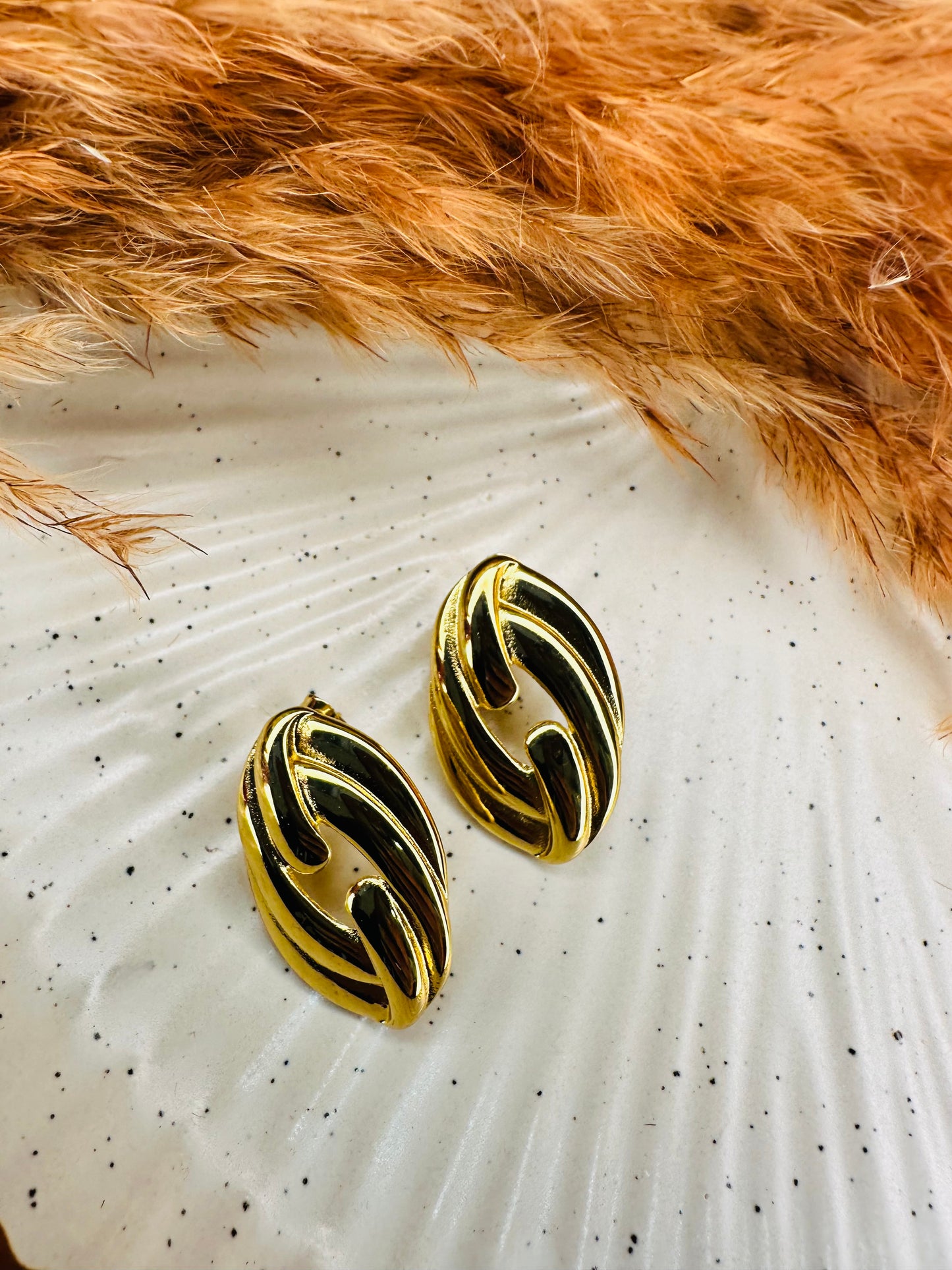 Close-up Detailing of HeyBae Gold-Tone Twisted Oval Hoop Earrings