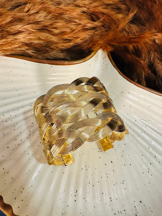 Side profile of woven gold cuff bracelet – adjustable kada style