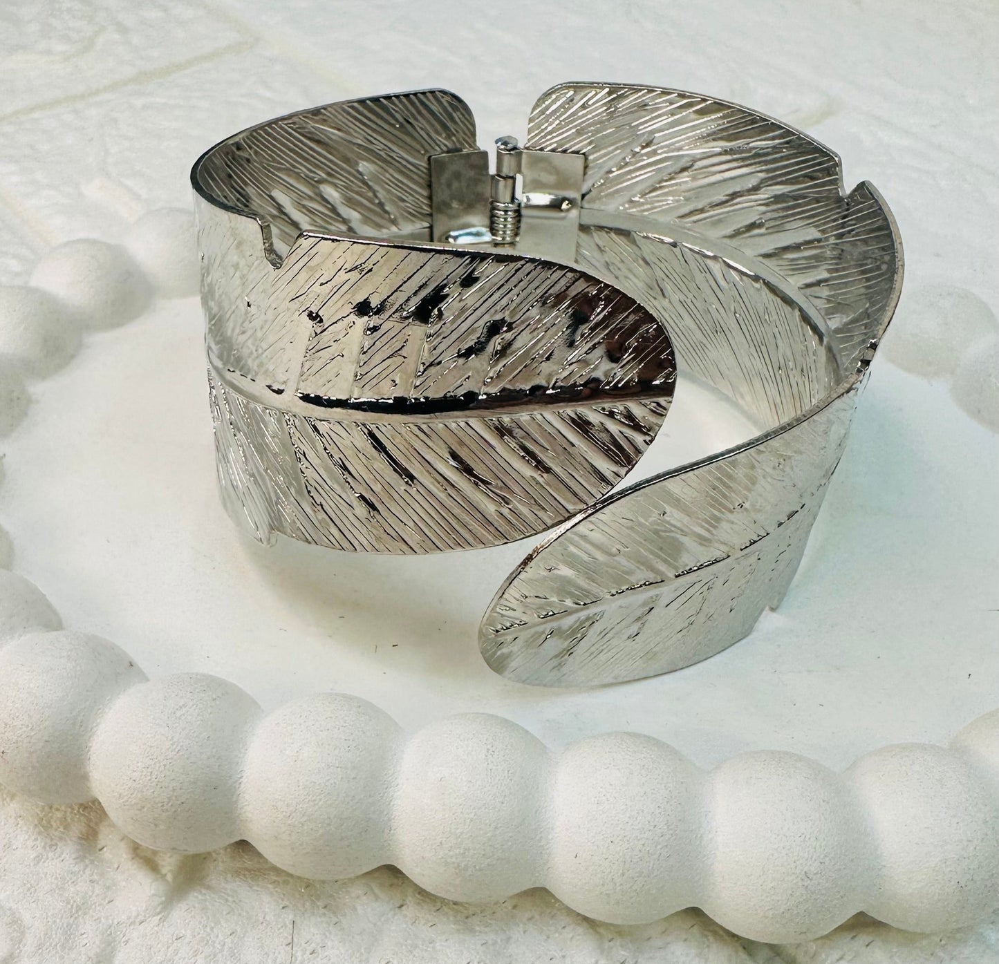 Side angle of Silver Leaf Cuff Bracelet adjustable fit