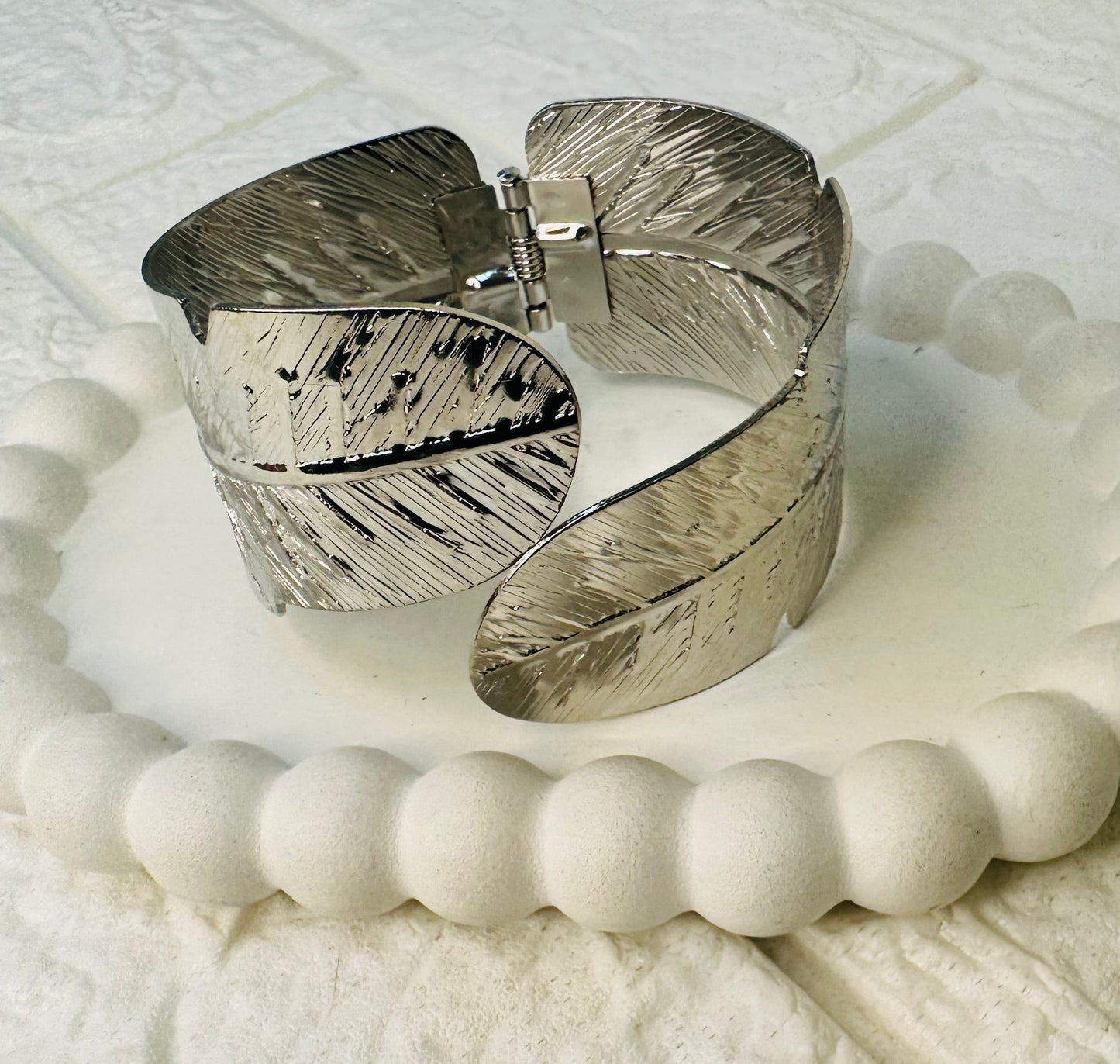 Close-up texture of Silver Leaf Statement Bracelet