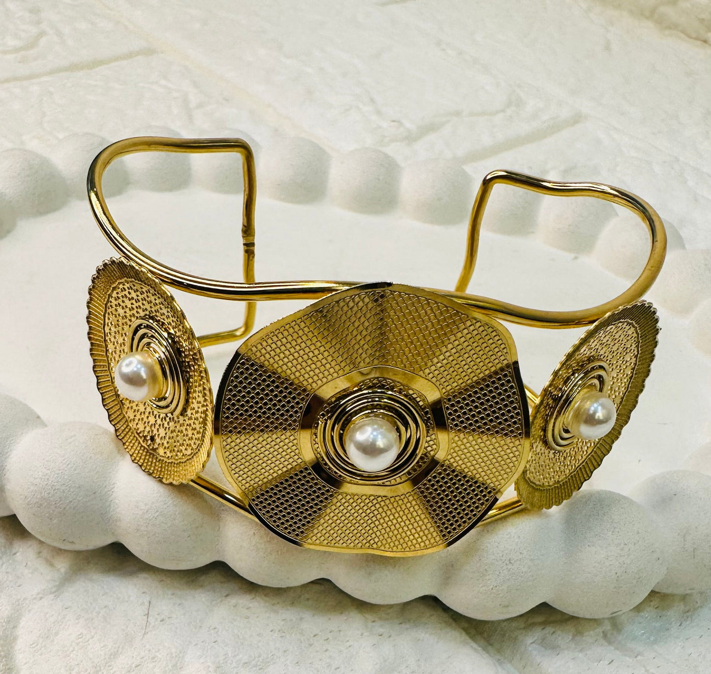 Festive statement cuff bracelet with gold and pearl accents
