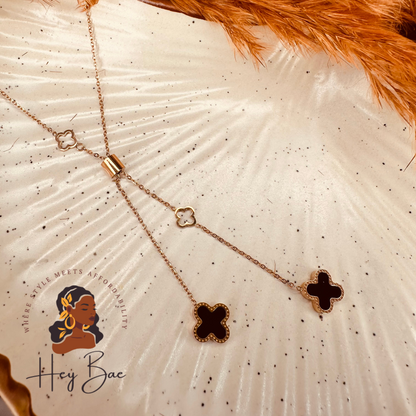 Clover Lariat Necklace – Black & Gold Four Leaf Charm Pendant