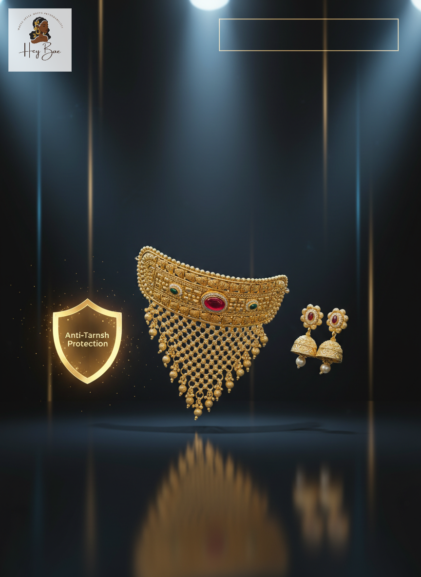 Gold necklace and earrings with 'Anti-Tarnish Protection' label on a dark background