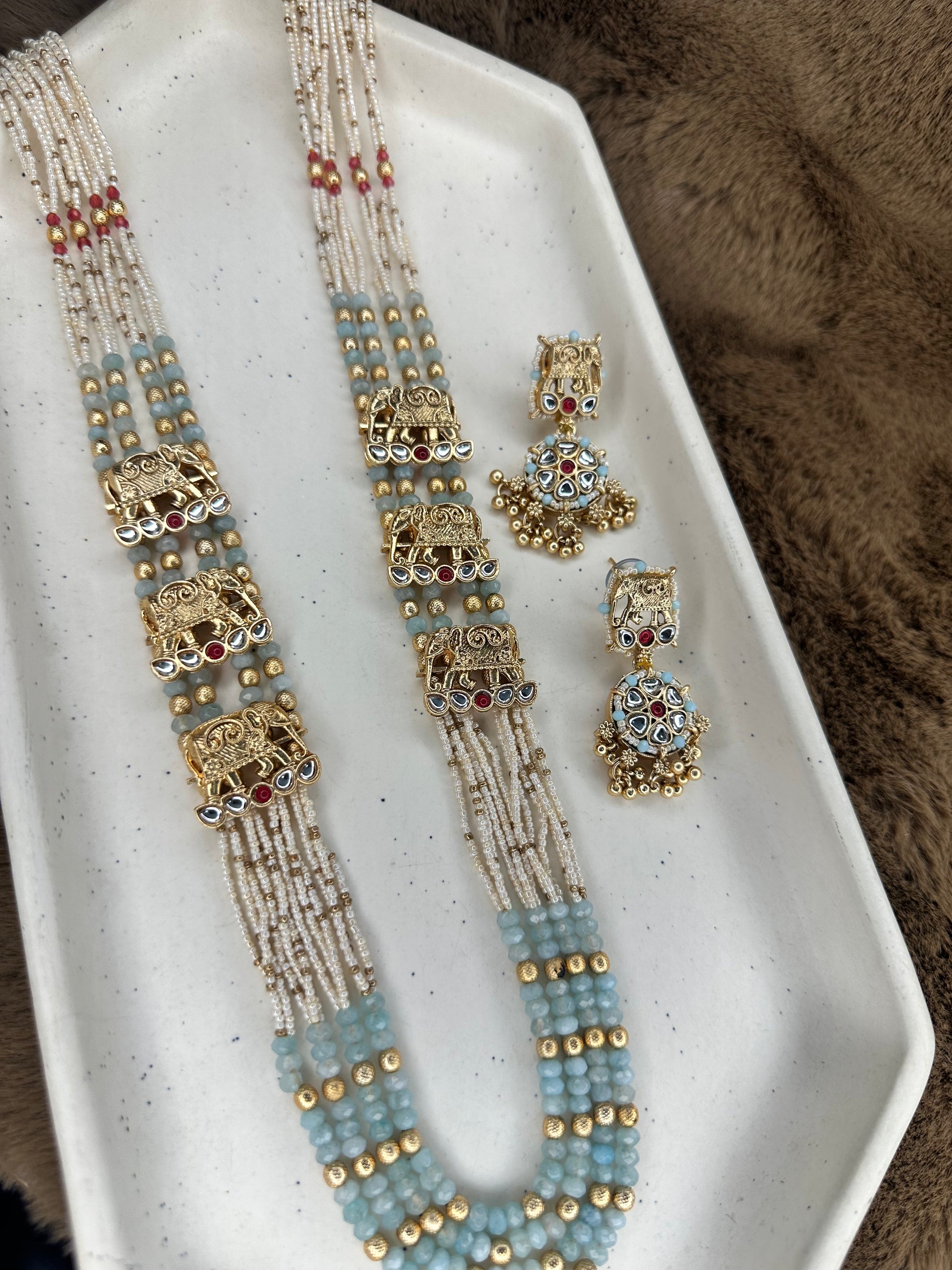 Elephant motif closeup jhumka earrings