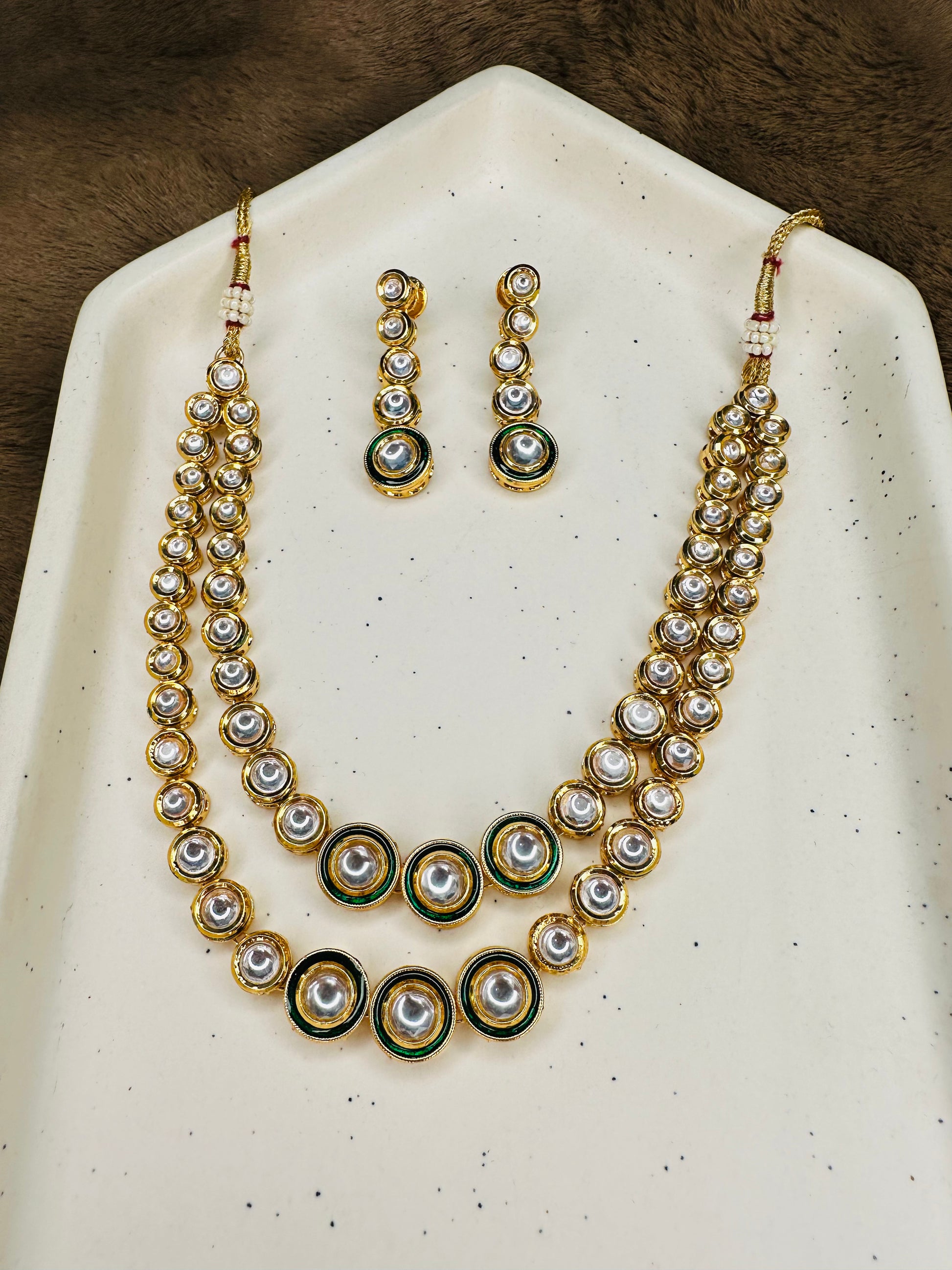 Layered polki bridal necklace flatlay