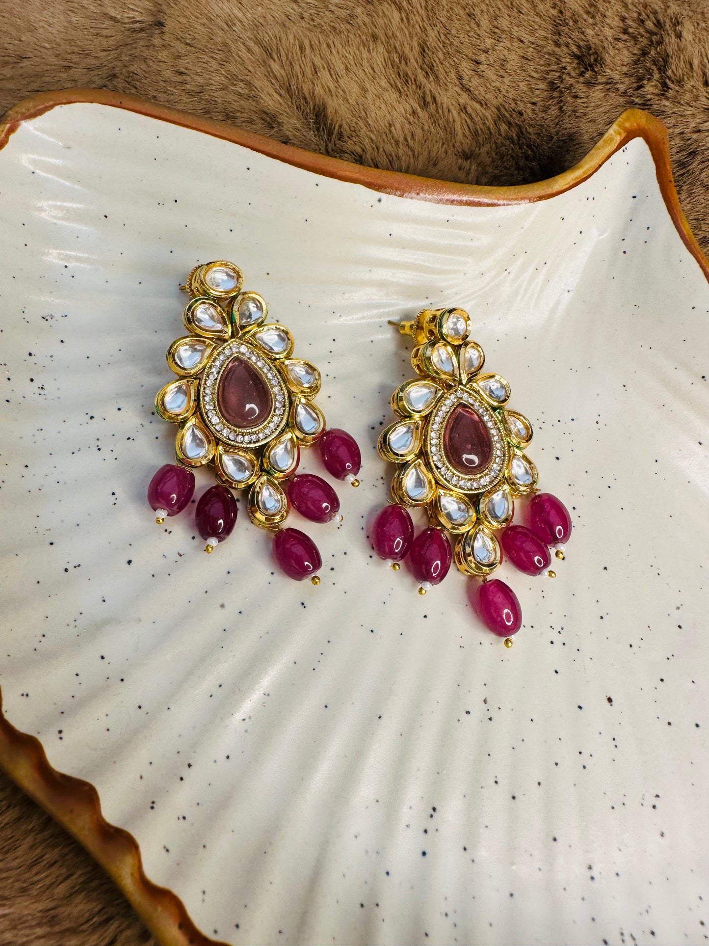 Blush pink kundan earrings closeup